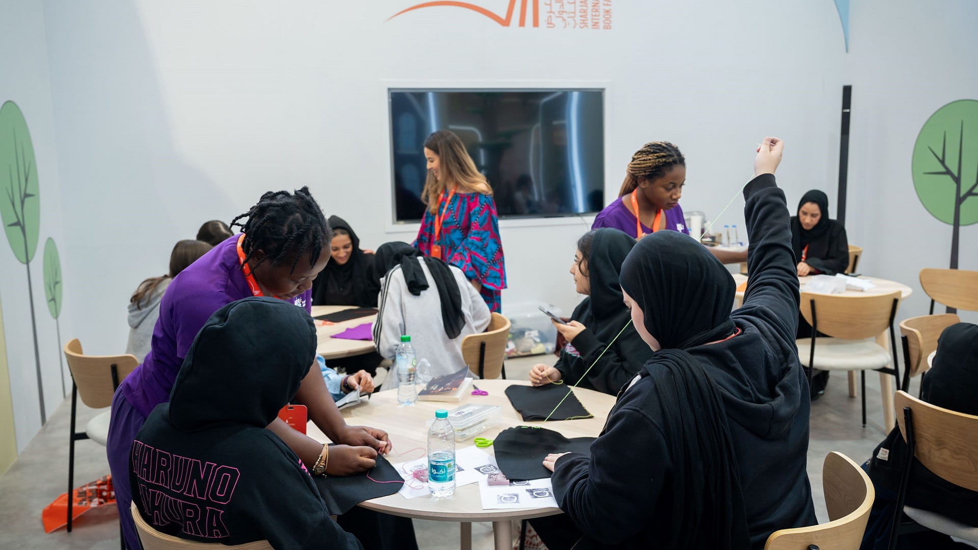 Image for the title: SIBF blends technology as children sew up colourful iPad covers 