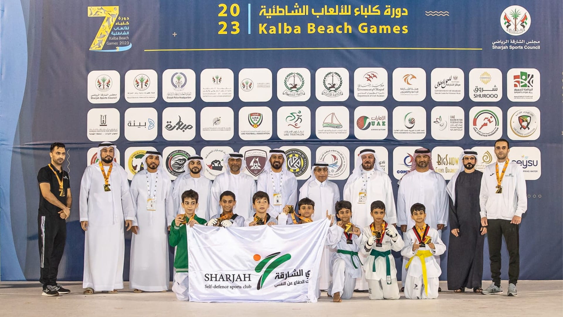 صورة بعنوان: تتويج أبطال التايكوندو والسلة والريشة الطائرة في كلباء الشاطئية 