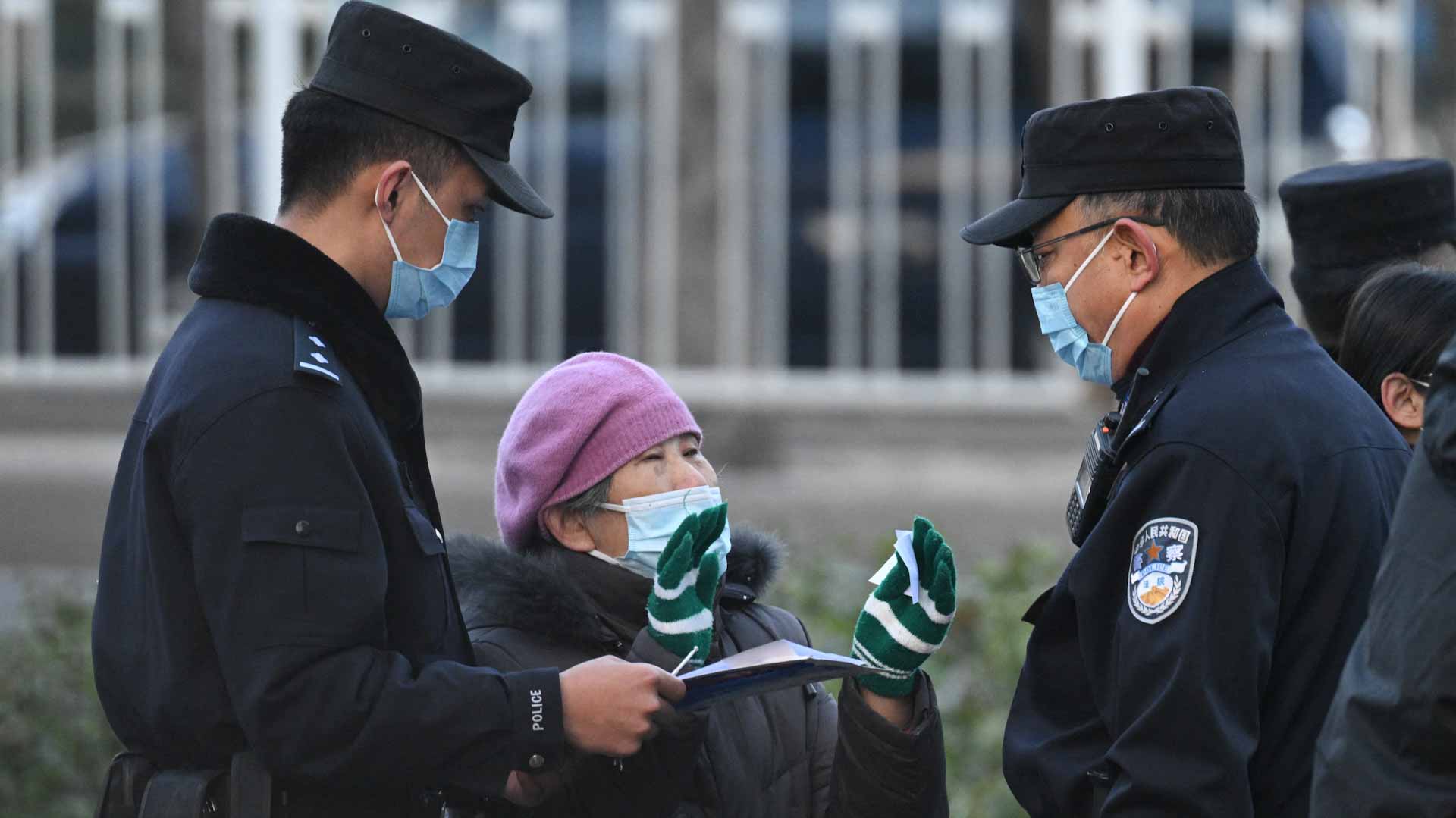 Image for the title: Families of Malaysia Airlines plane crash victims call for search 