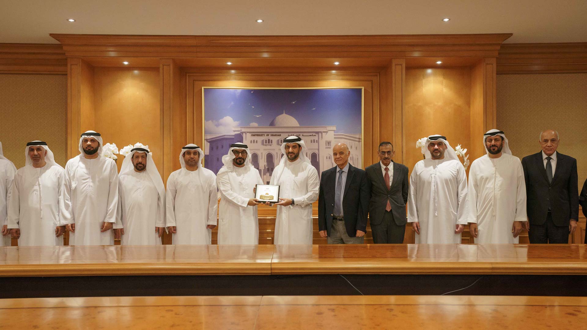 Image for the title: Sultan bin Ahmed witnesses signing of agreement between UOS, ERC 