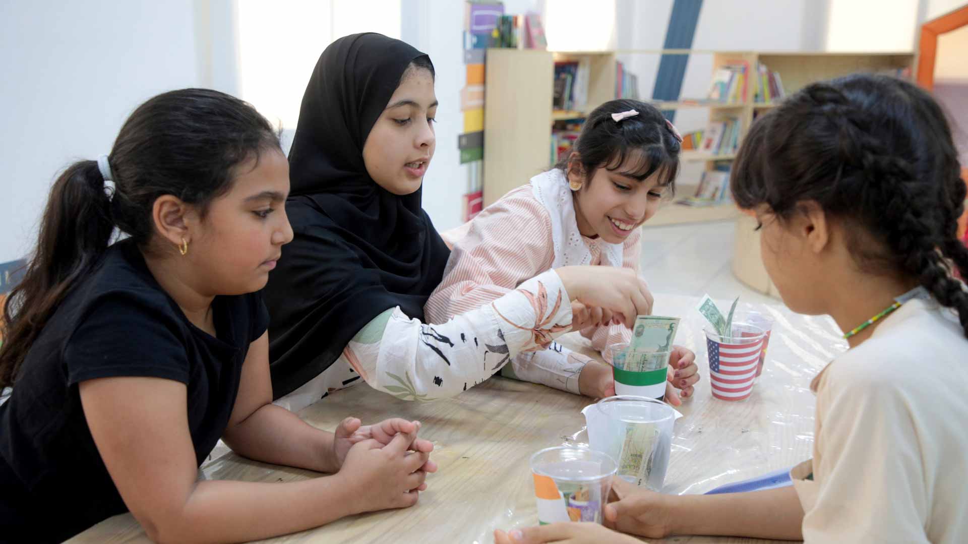 Image for the title: "Sharjah Children" promotes the “Saving” concept in children 
