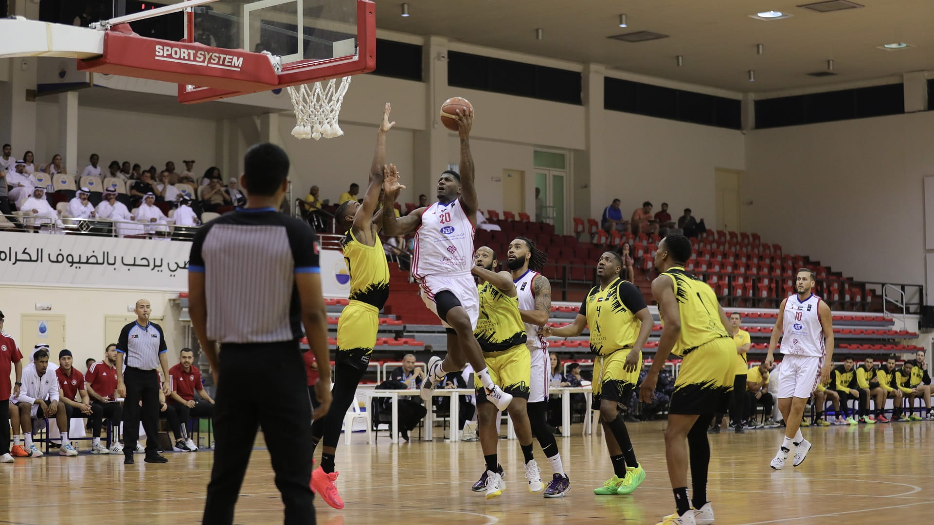 Image for the title: Sharjah wins its season-opening basketball match against Al-Wasl 