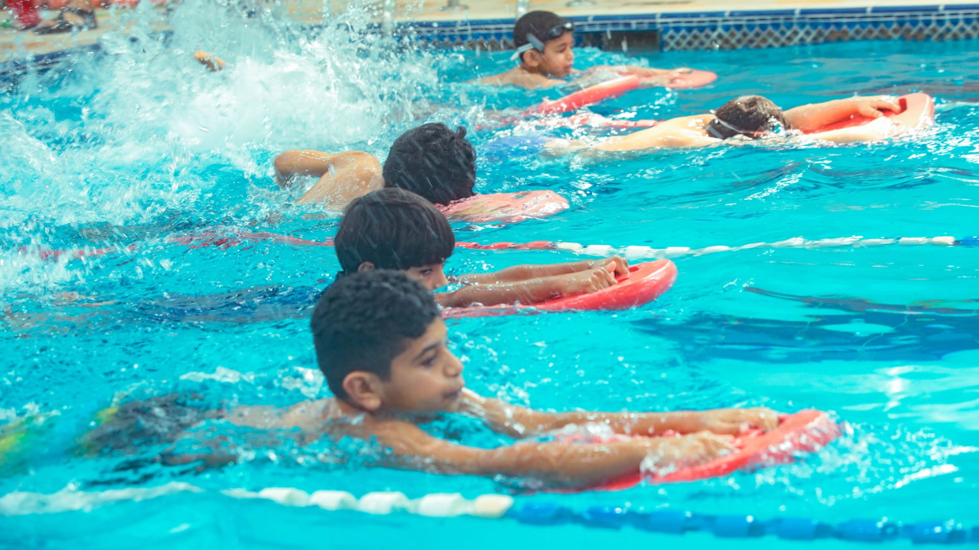 Image for the title: 170 members participate in Sharjah Children’s Swimming Festival 