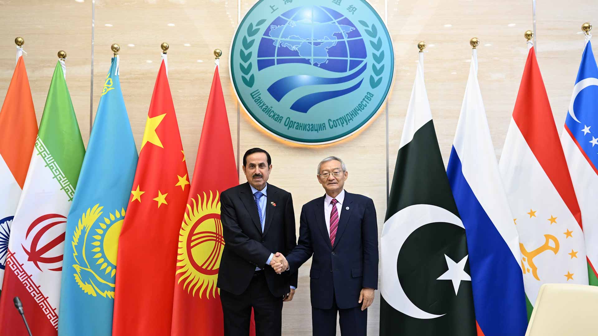 Image for the title: Saqr Ghobash meets with SG of Shanghai Organisation 
