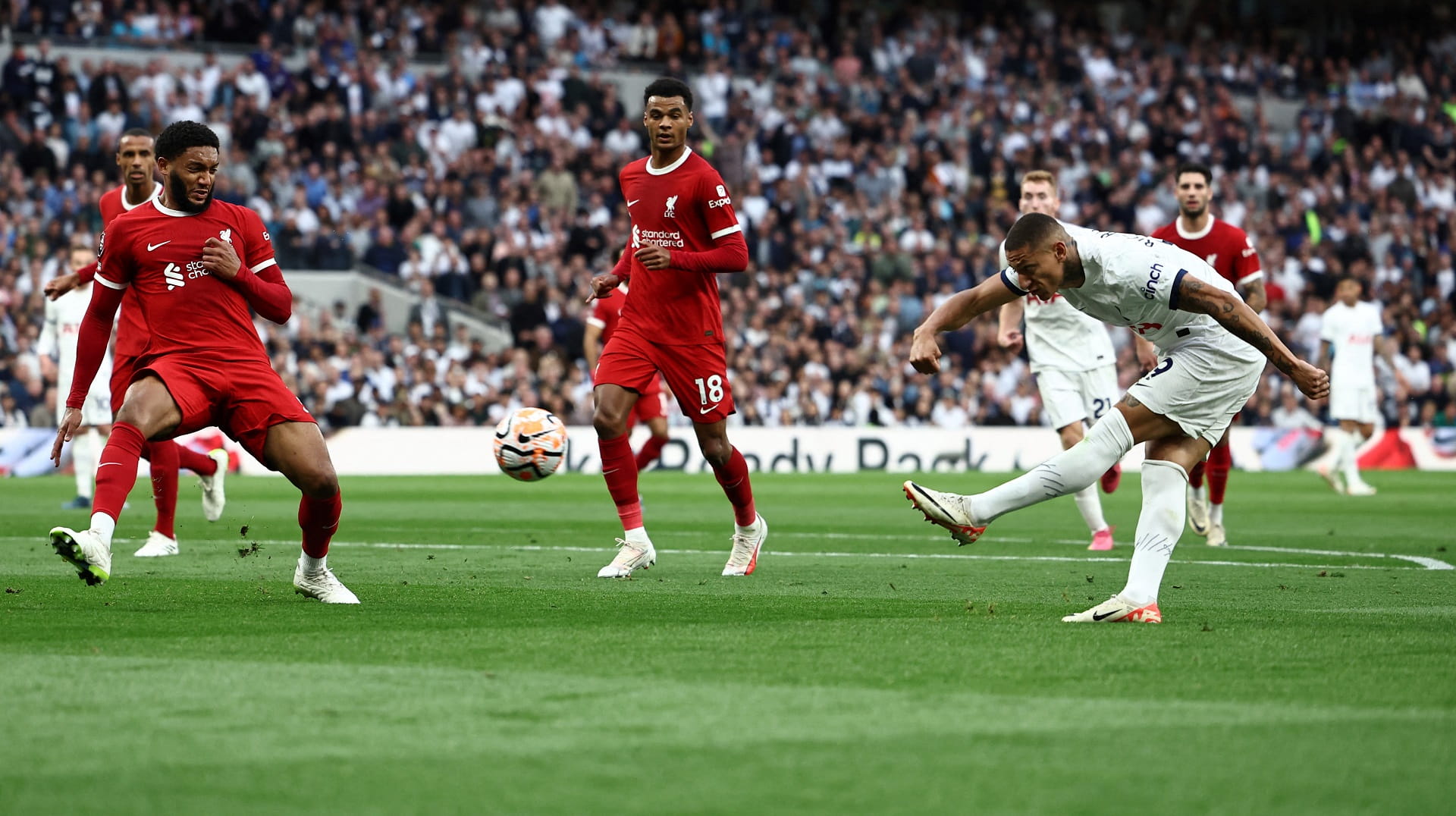 Image for the title: Spurs sink nine-man Liverpool thanks to last-gasp Matip own goal 