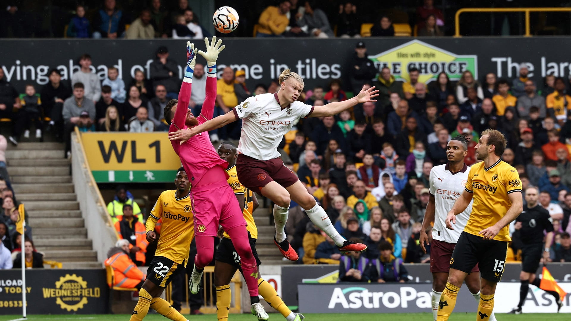Image for the title: Wolves end Man City's perfect start with shock win 
