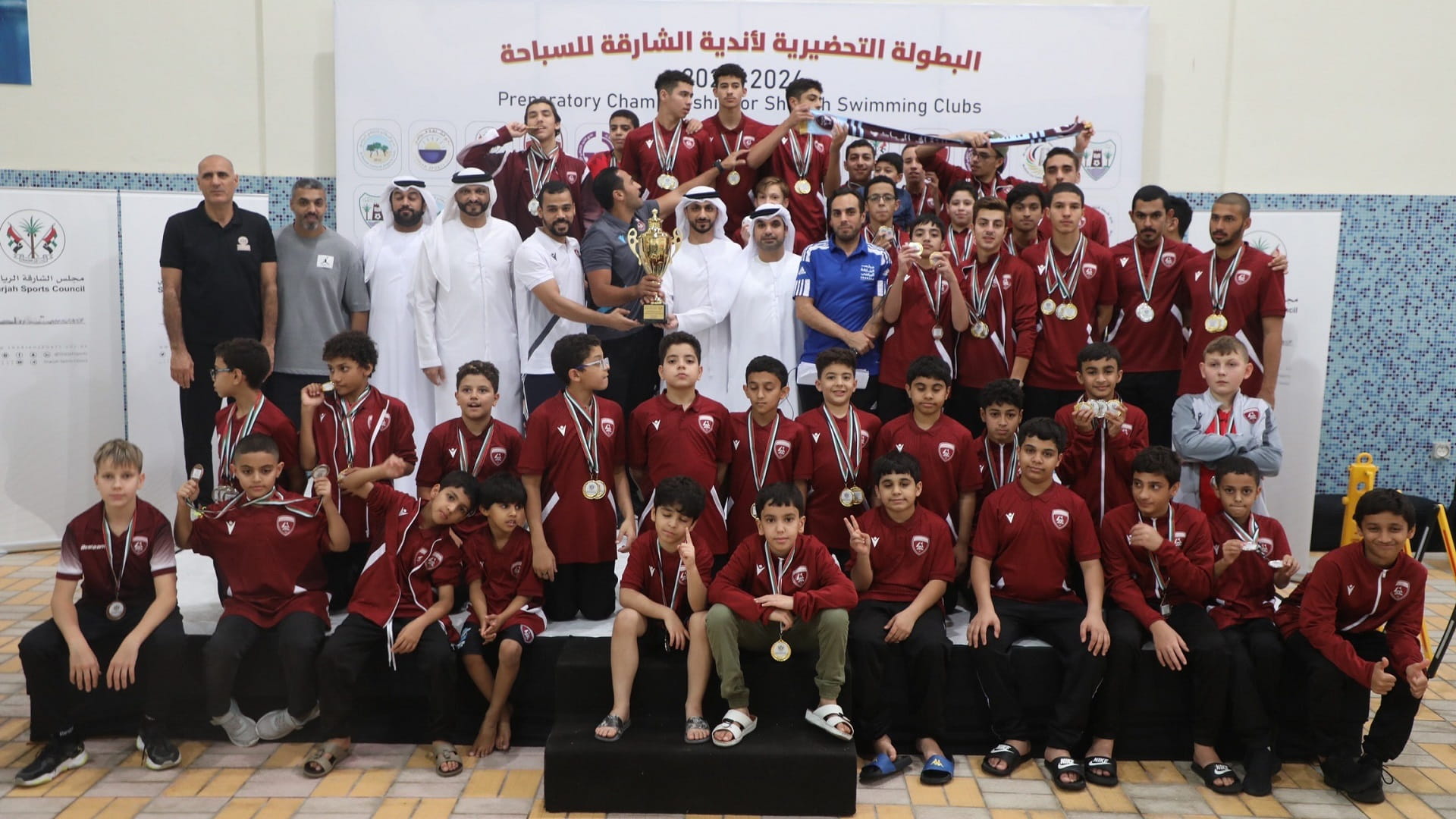 Image for the title: Al Hamriyah hosts clubs prep. swimming champ, wins first place 