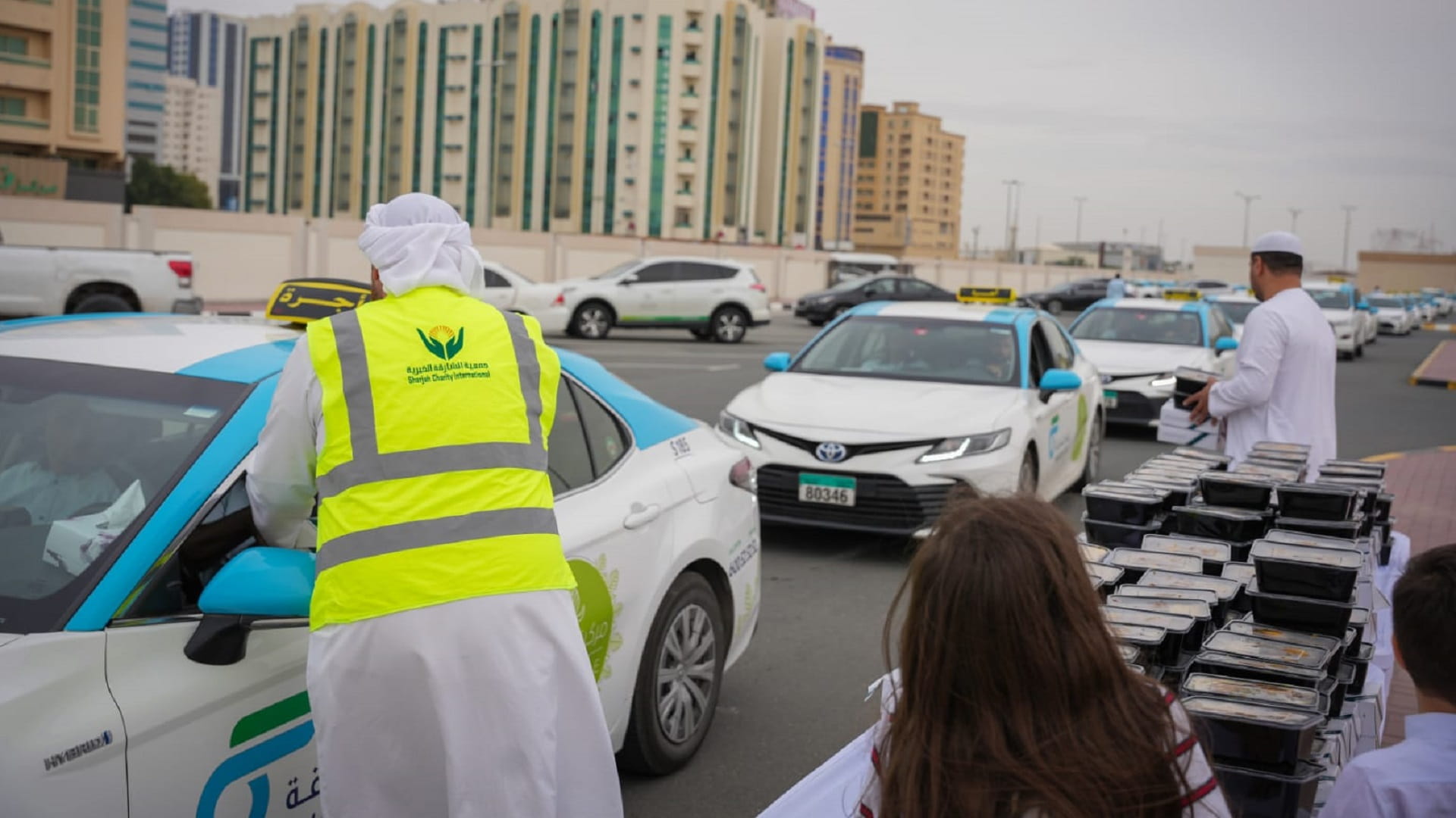 Image for the title: SCI distributes 15,000 Iftar meals to taxi drivers 