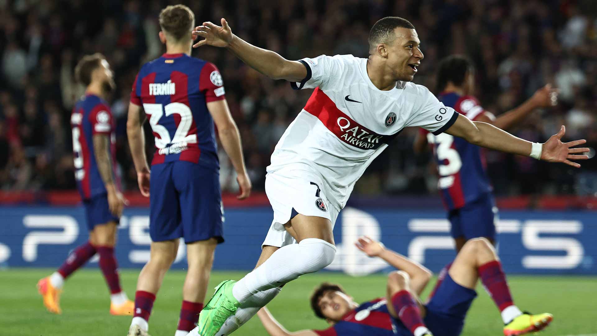 Image for the title: Mbappe's PSG punish 10-man Barca to reach Champions League semis 
