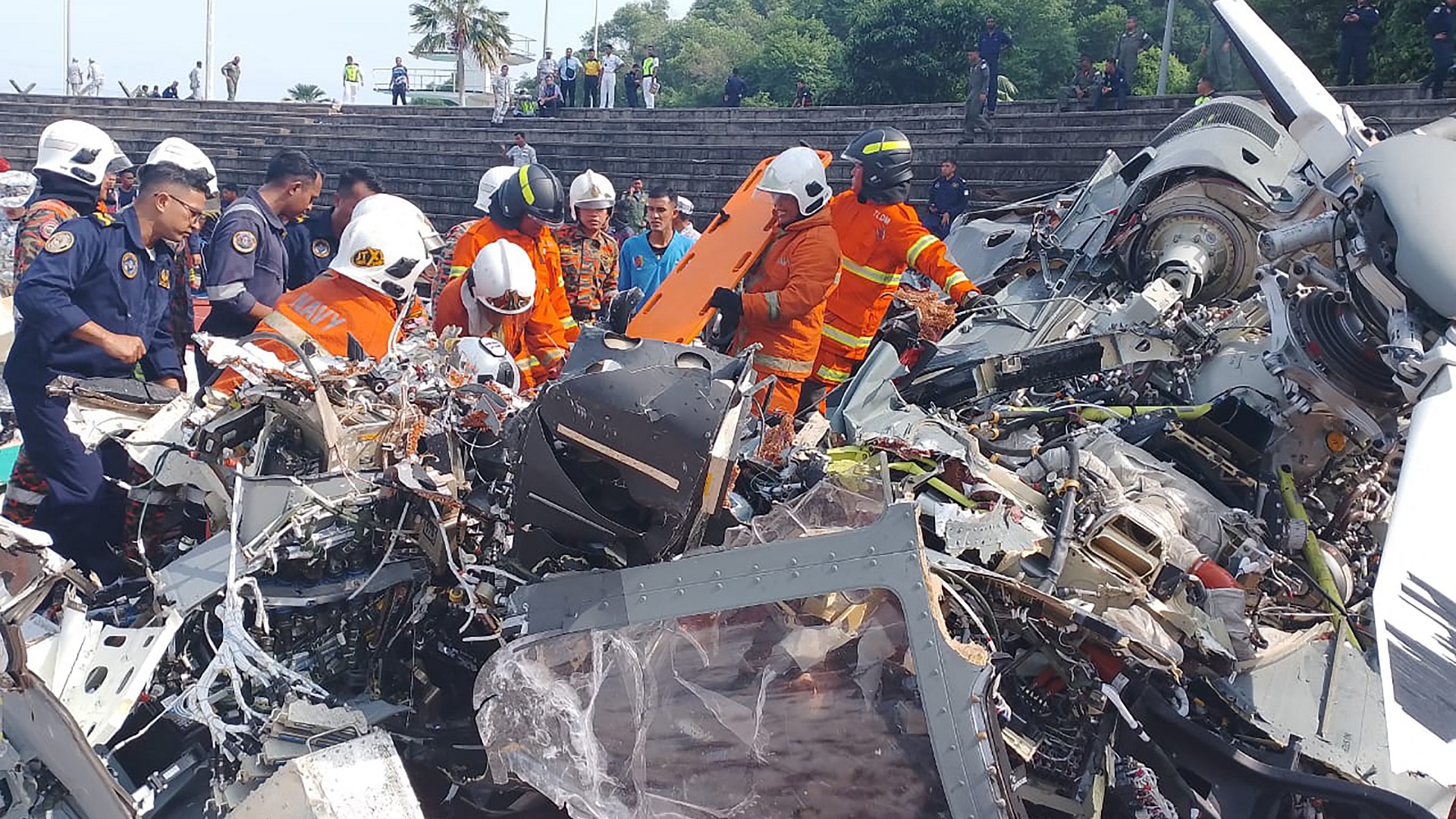 Image for the title: Malaysia military helicopters crash, killing 10 