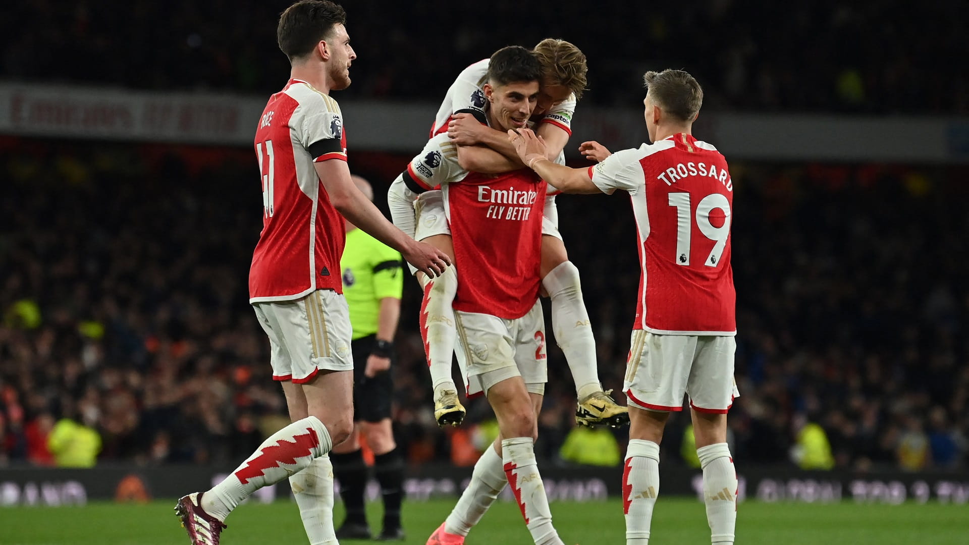 Image for the title: Five-star Arsenal thrash Chelsea to open up Premier League lead 