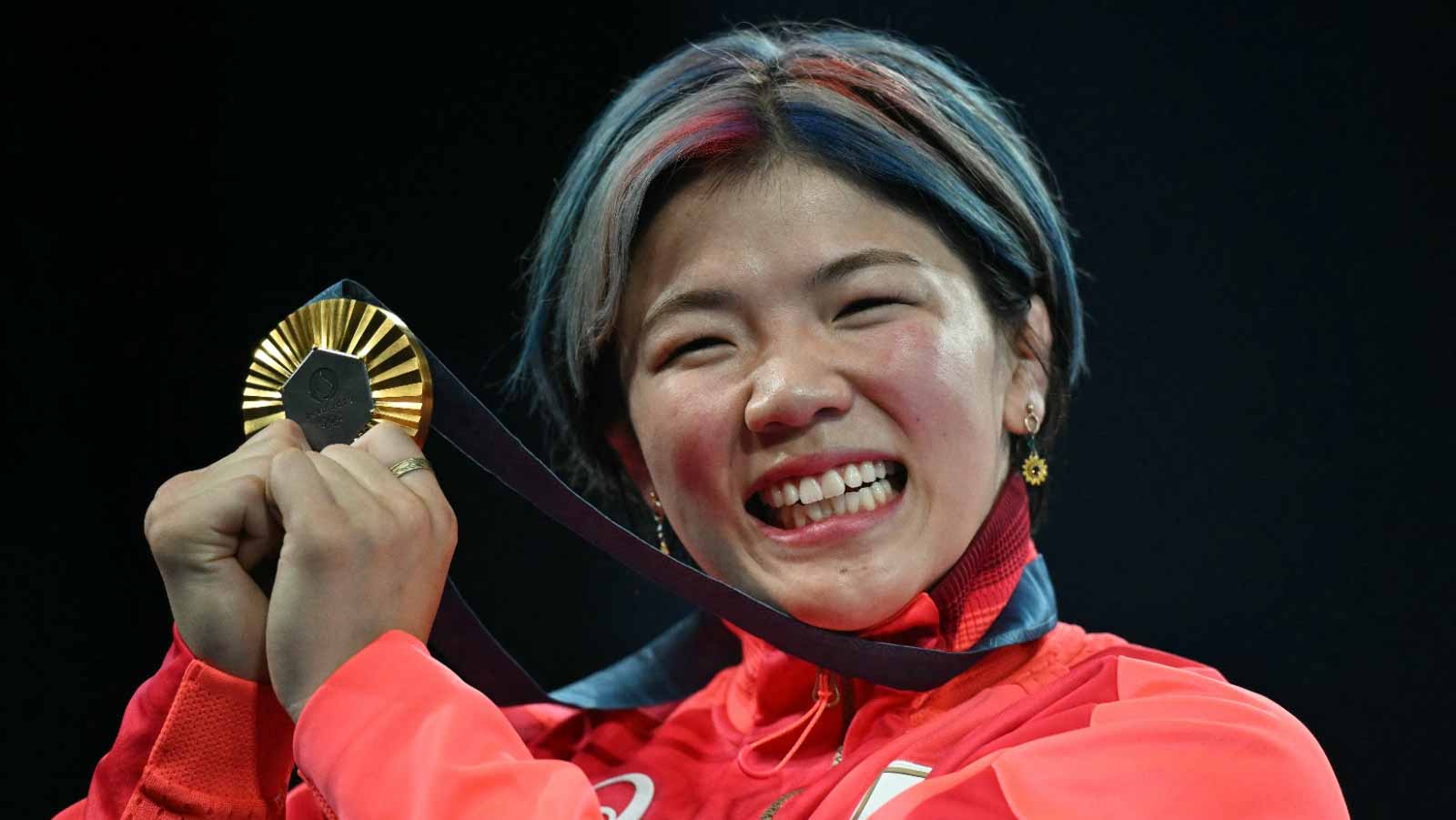 Image for the title: Wrestling: Kiyooka, Kagami lead Japan to Olympic glory in Paris 