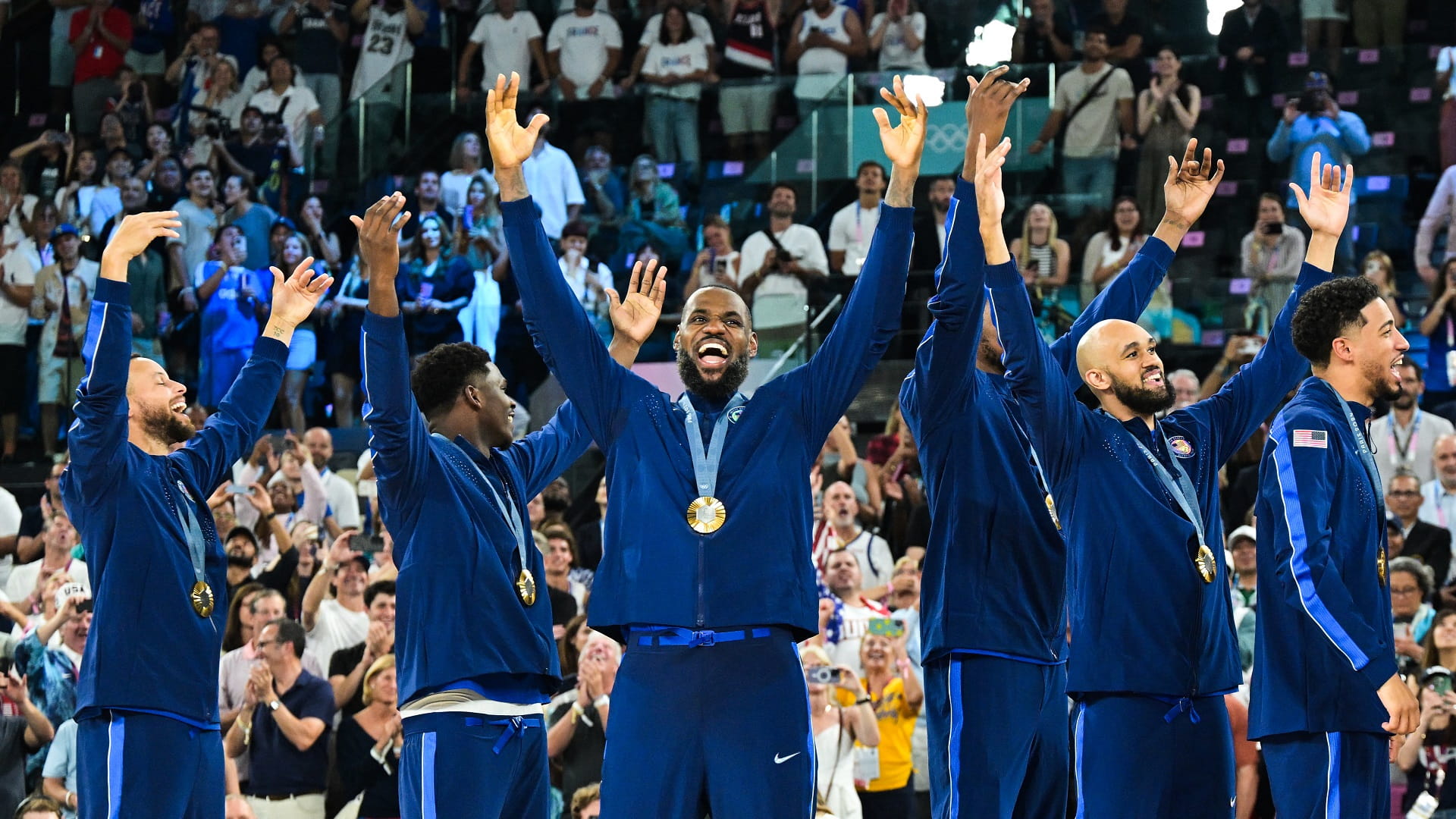 Image for the title: USA beat France 98-87 for men's basketball Olympic gold 