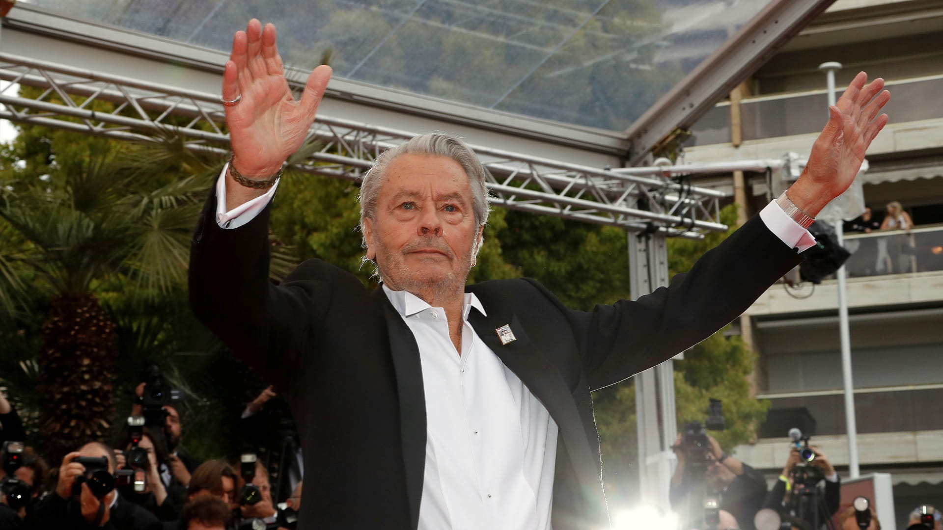 Image for the title: French film legend Alain Delon dies at 88 