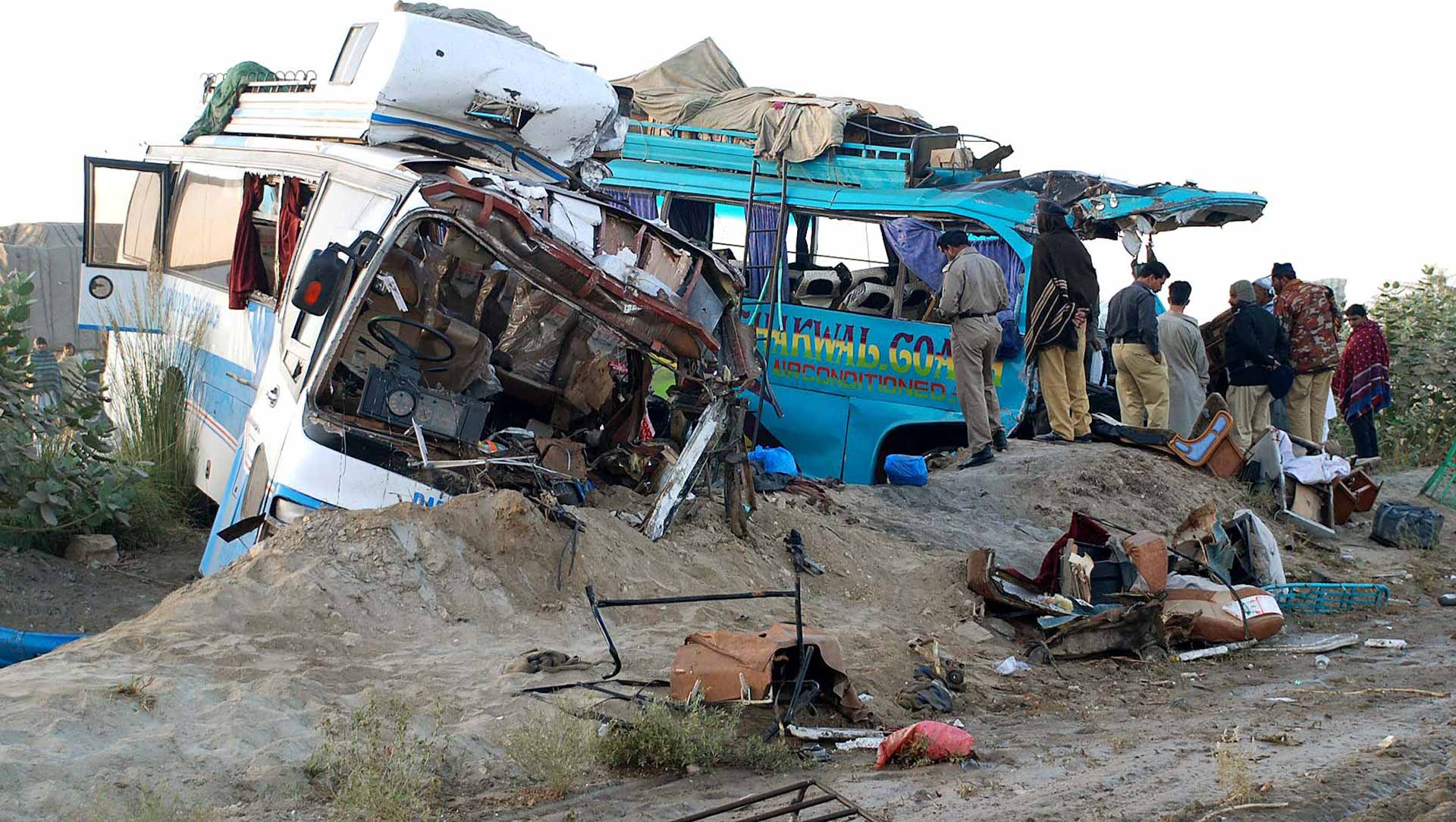 Image for the title: At least 22 dead in Pakistan bus crash: rescue officials 