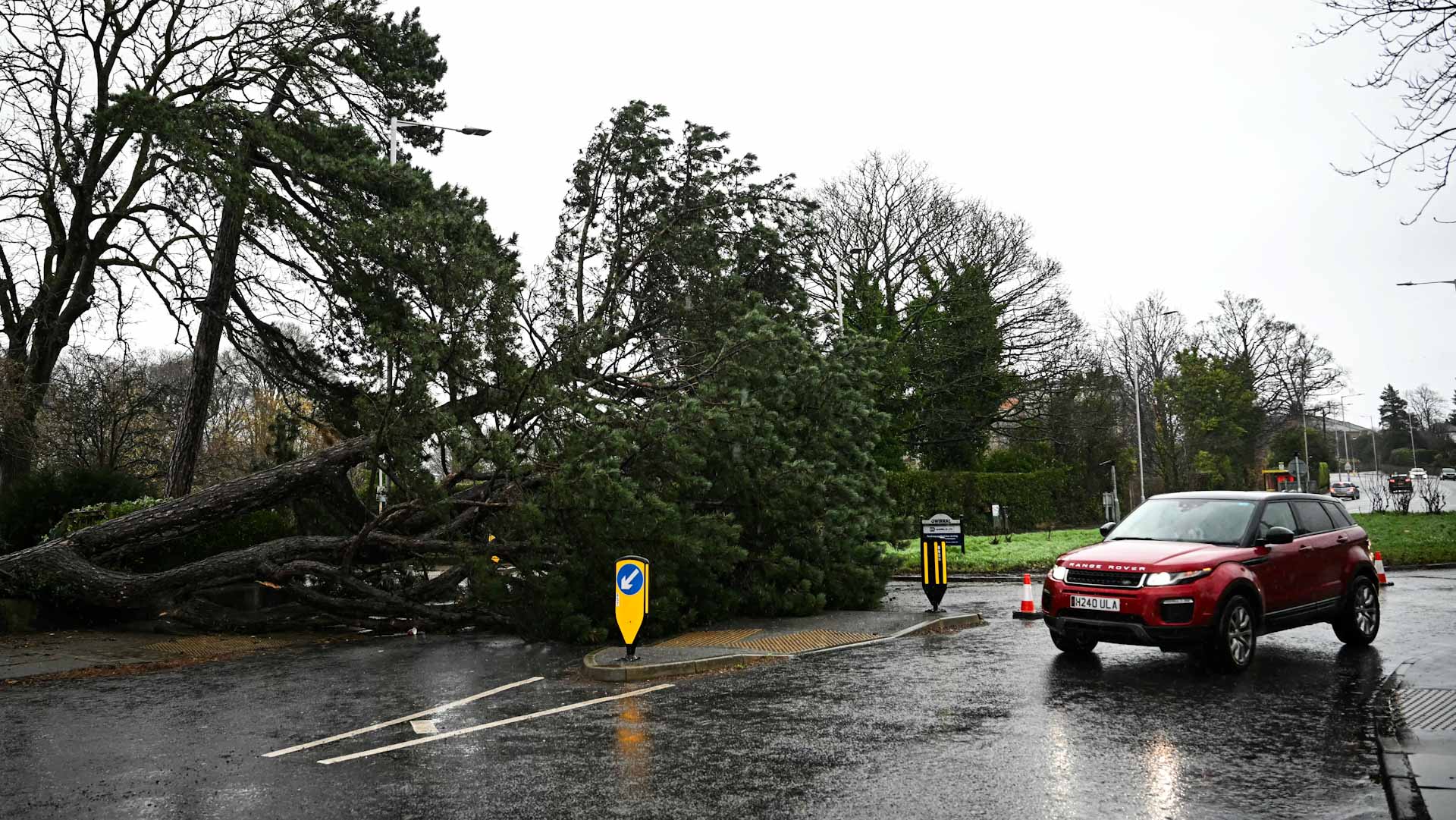 Image for the title: Two dead as Storm Darragh batters UK 