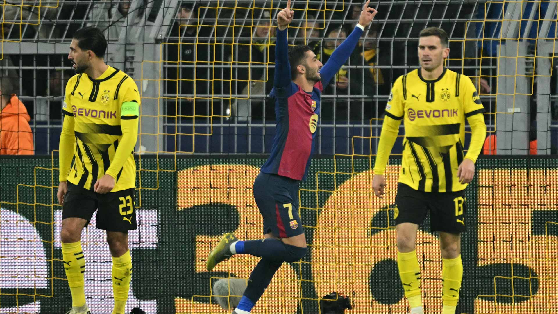 Torres sinks Dortmund to send Barcelona into knockouts 