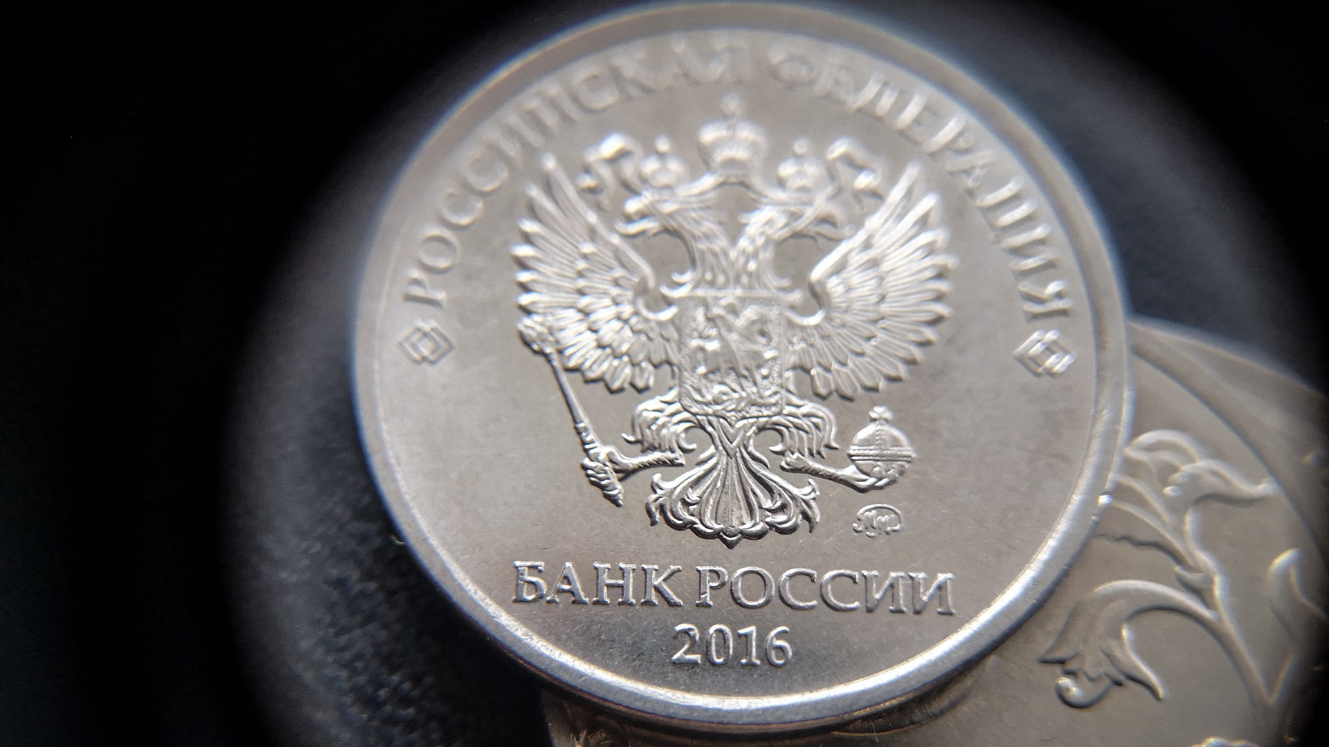 Russia central bank holds off rate hike after criticism