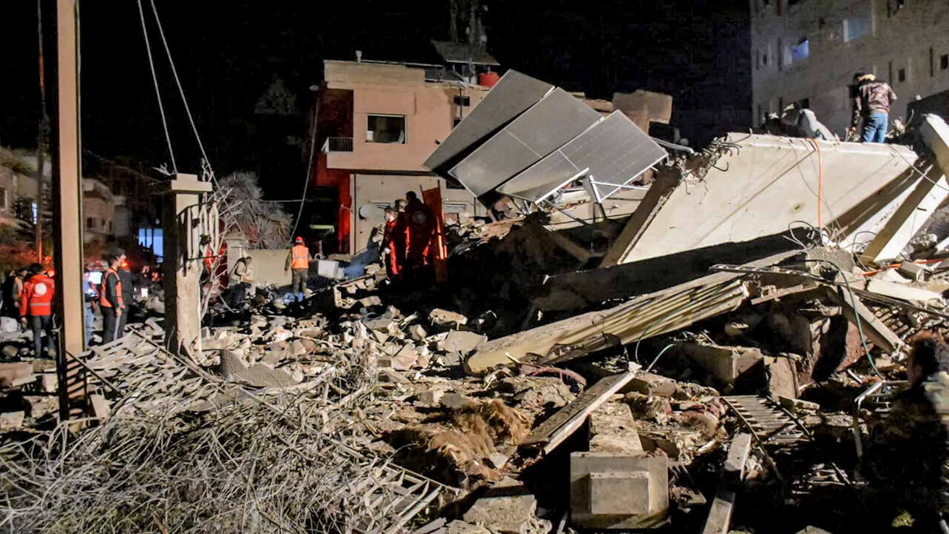 Image for the title: Civilians among 11 dead in Israel strikes on Syria 