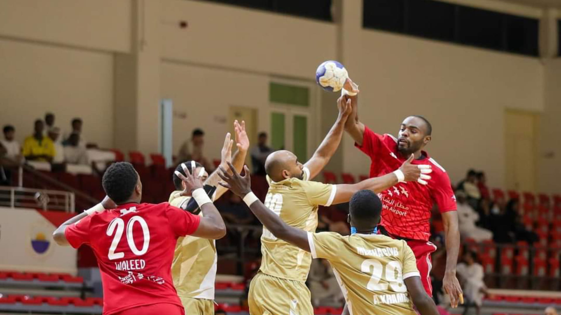 Image for the title: Sharjah defeats Mleiha and tops handball league 