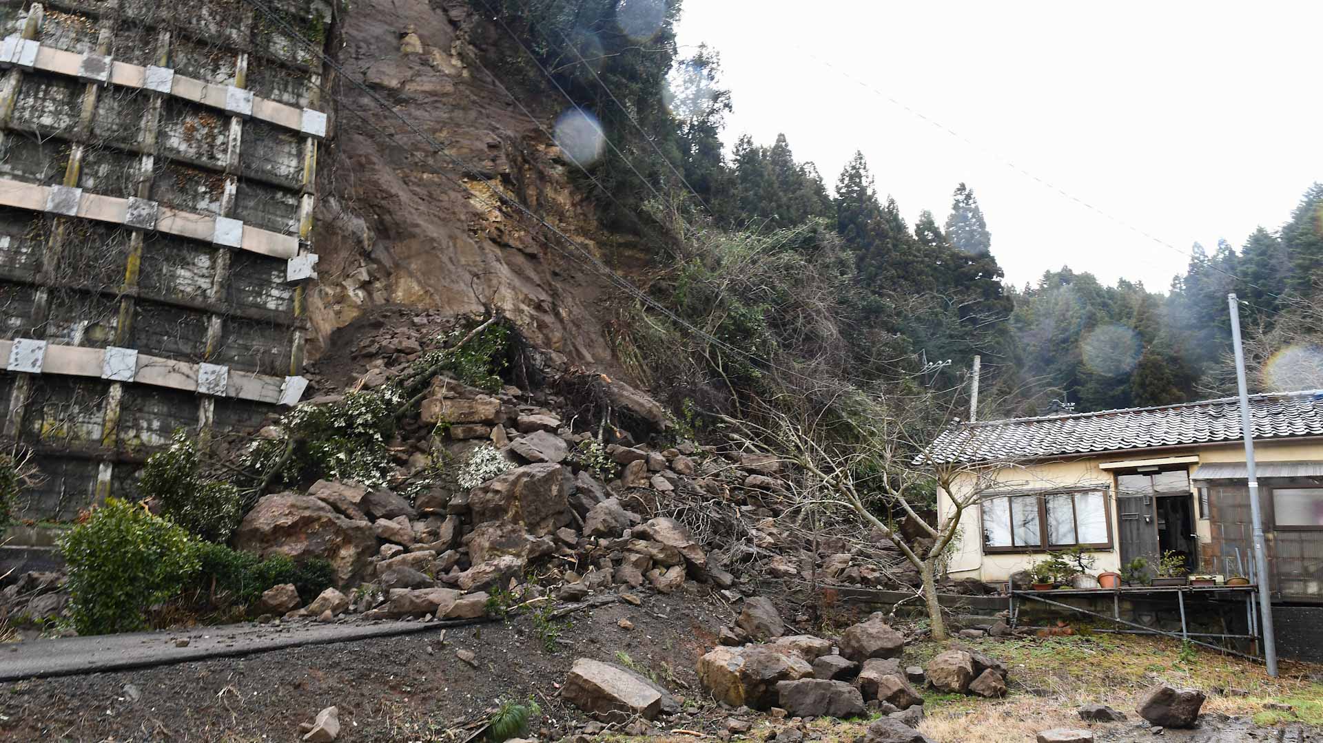 Image for the title: Japanese villages wait for help after quake 
