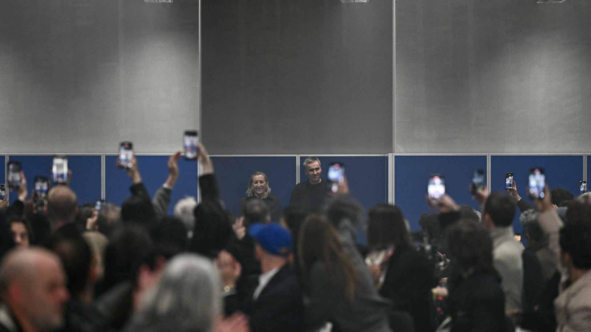 Image for the title: Between the office and nature for Prada's winter menswear 