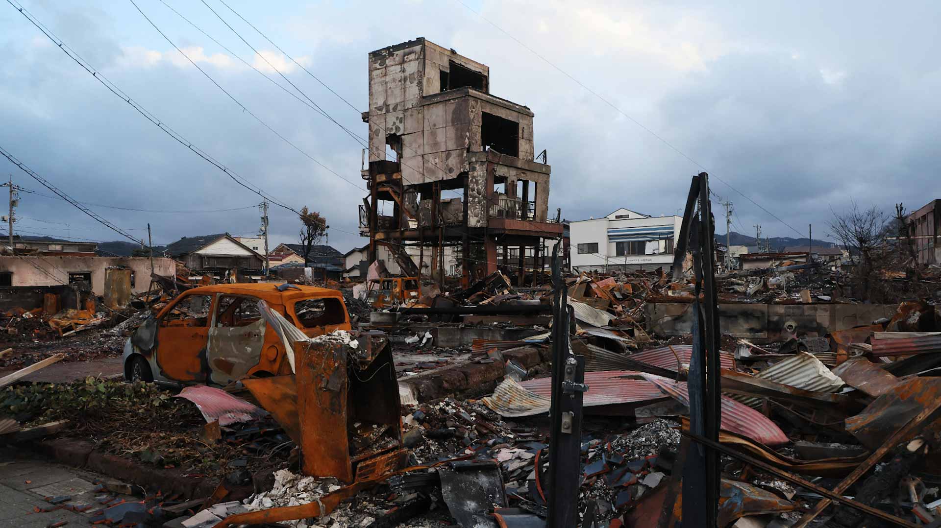 Image for the title: Japan to double emergency funds after New Year's Day quake 