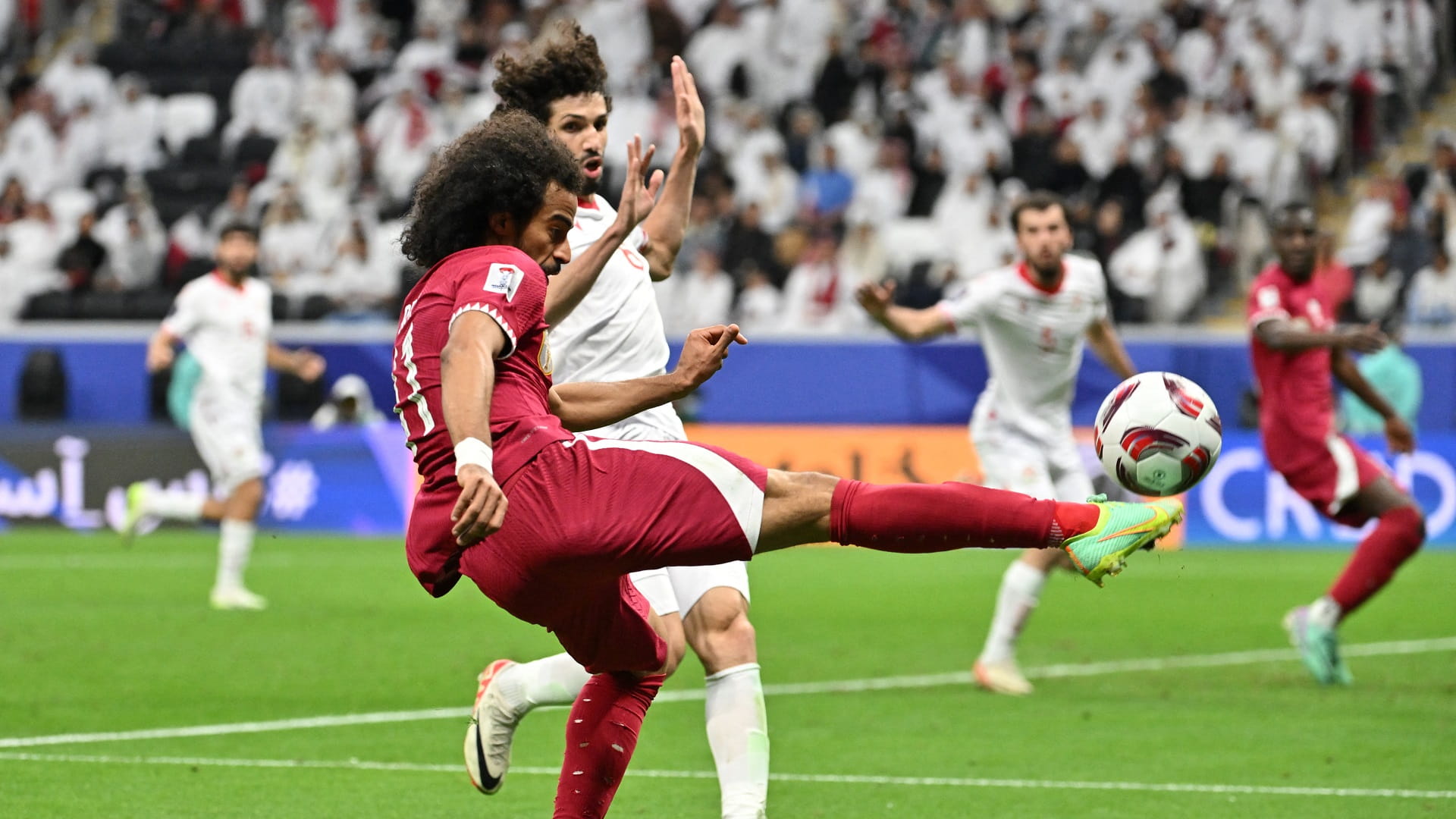 Image for the title: Qatar first team to reach Asian Cup last 16 
