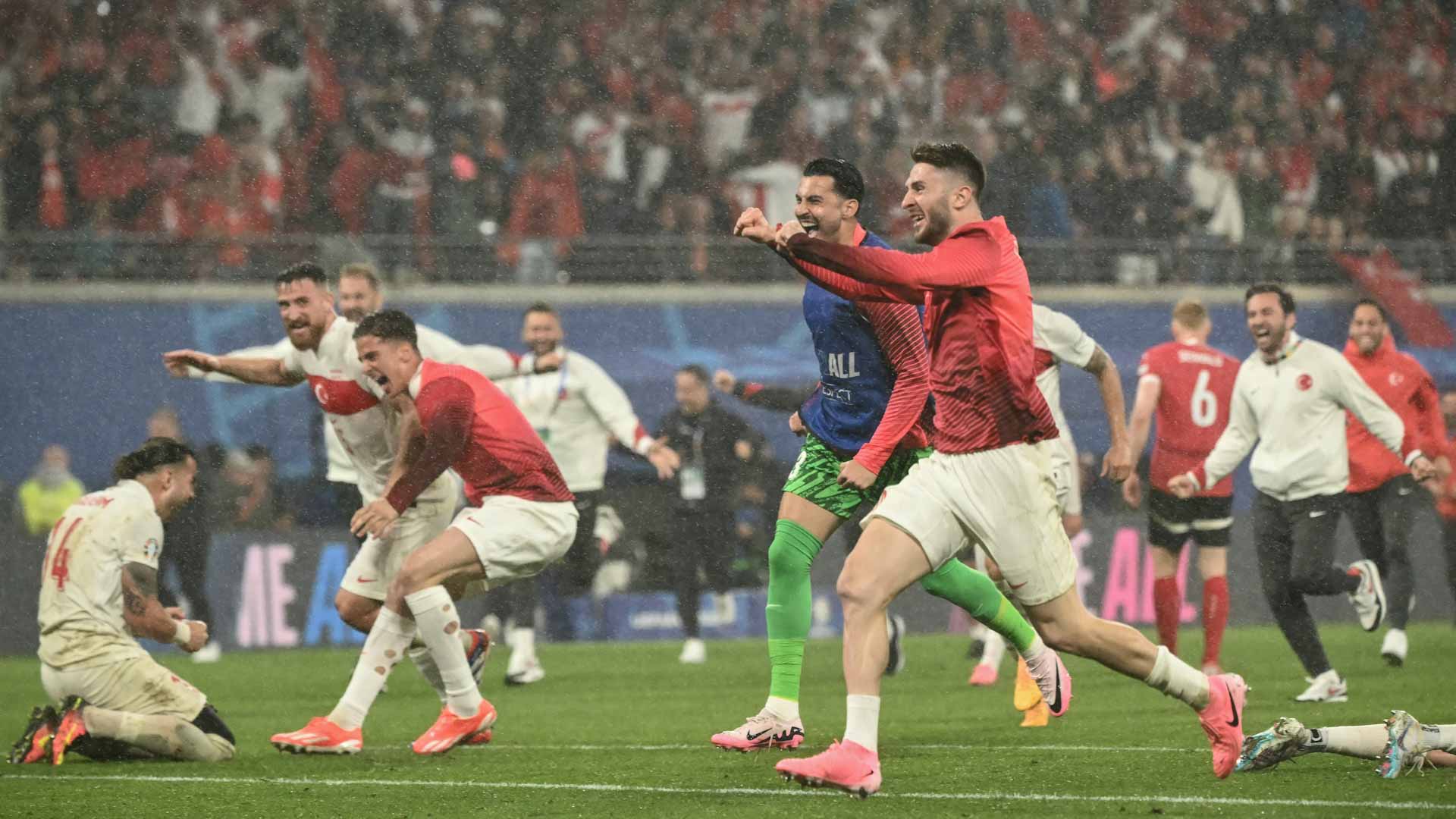 Image for the title: Turkey reach Euro 2024 quarters with 2-1 win over Austria 