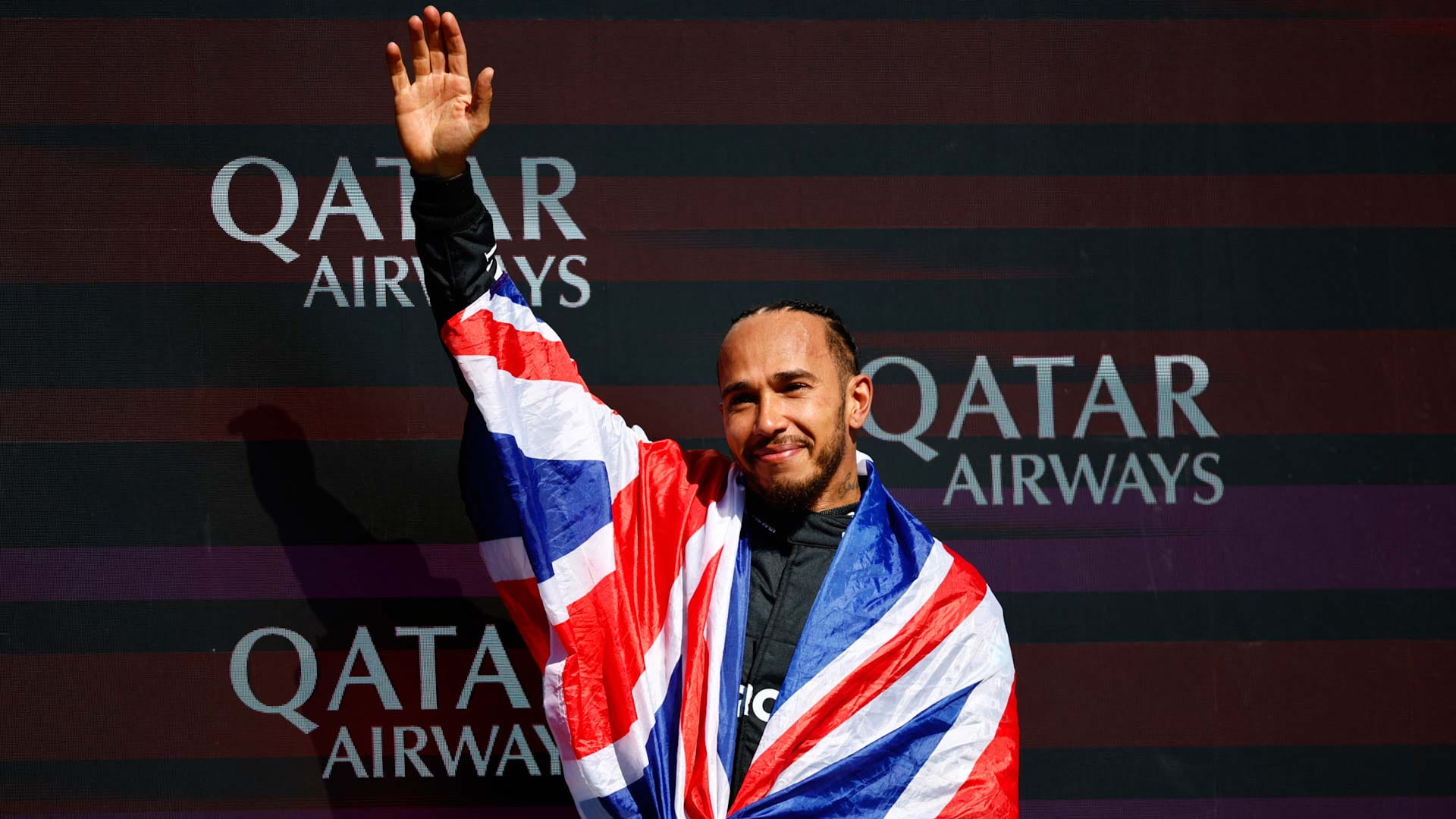 Image for the title: Hamilton wins British Grand Prix to end three-year drought 