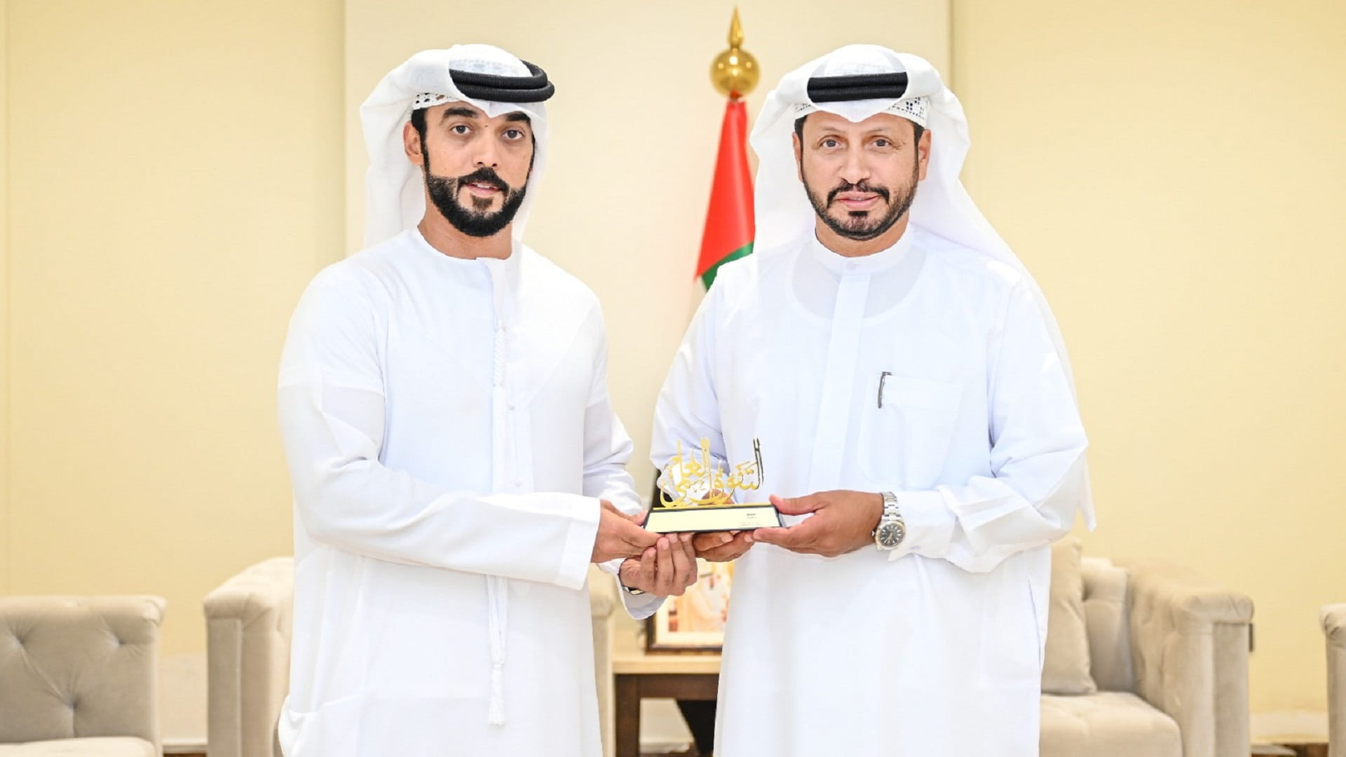 Image for the title: SP Commander congratulates officer on master's degree 