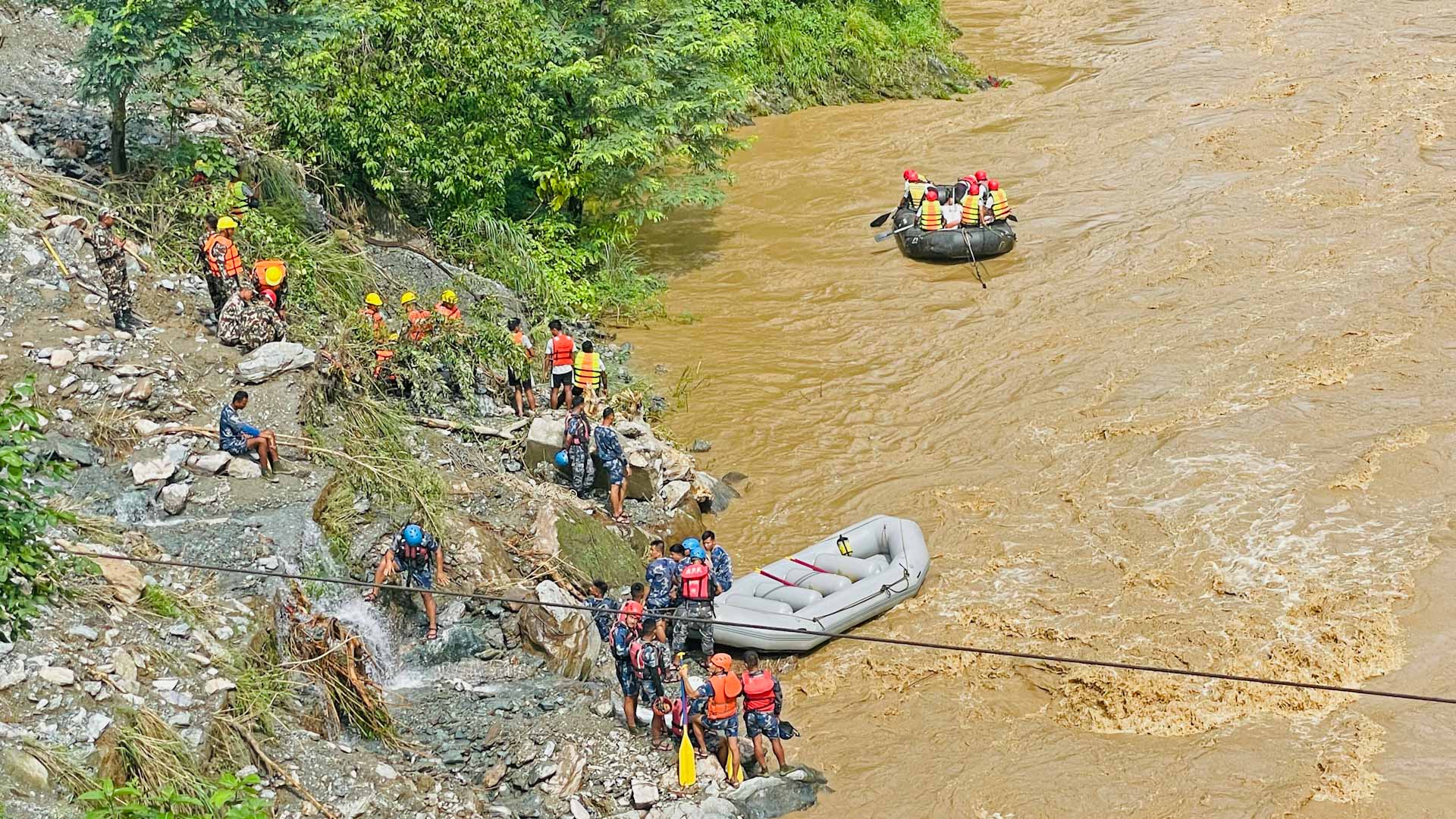 Image for the title: Nepal searches for 63 missing after highway landslide 