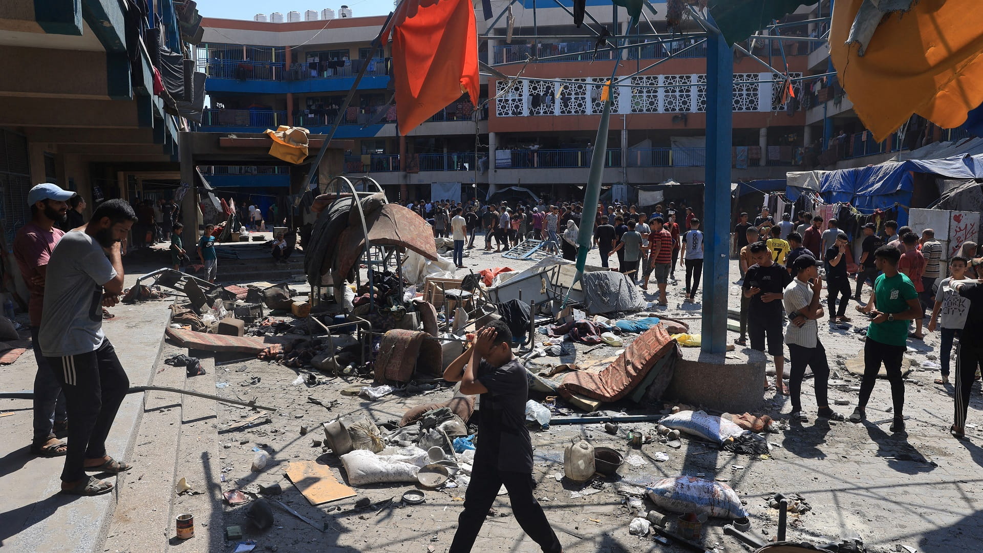 Image for the title: Israel in new Gaza school strike 