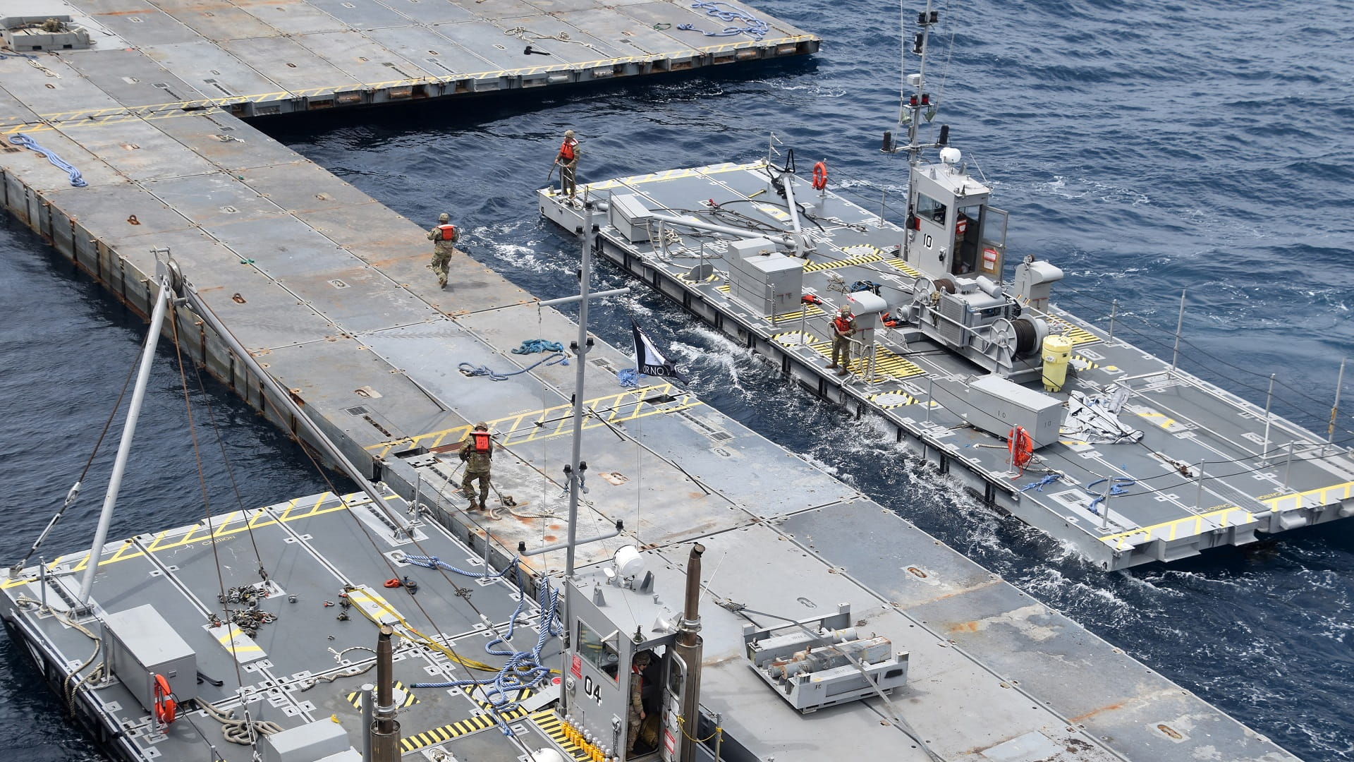 Image for the title: US military declares end of troubled Gaza aid pier mission 