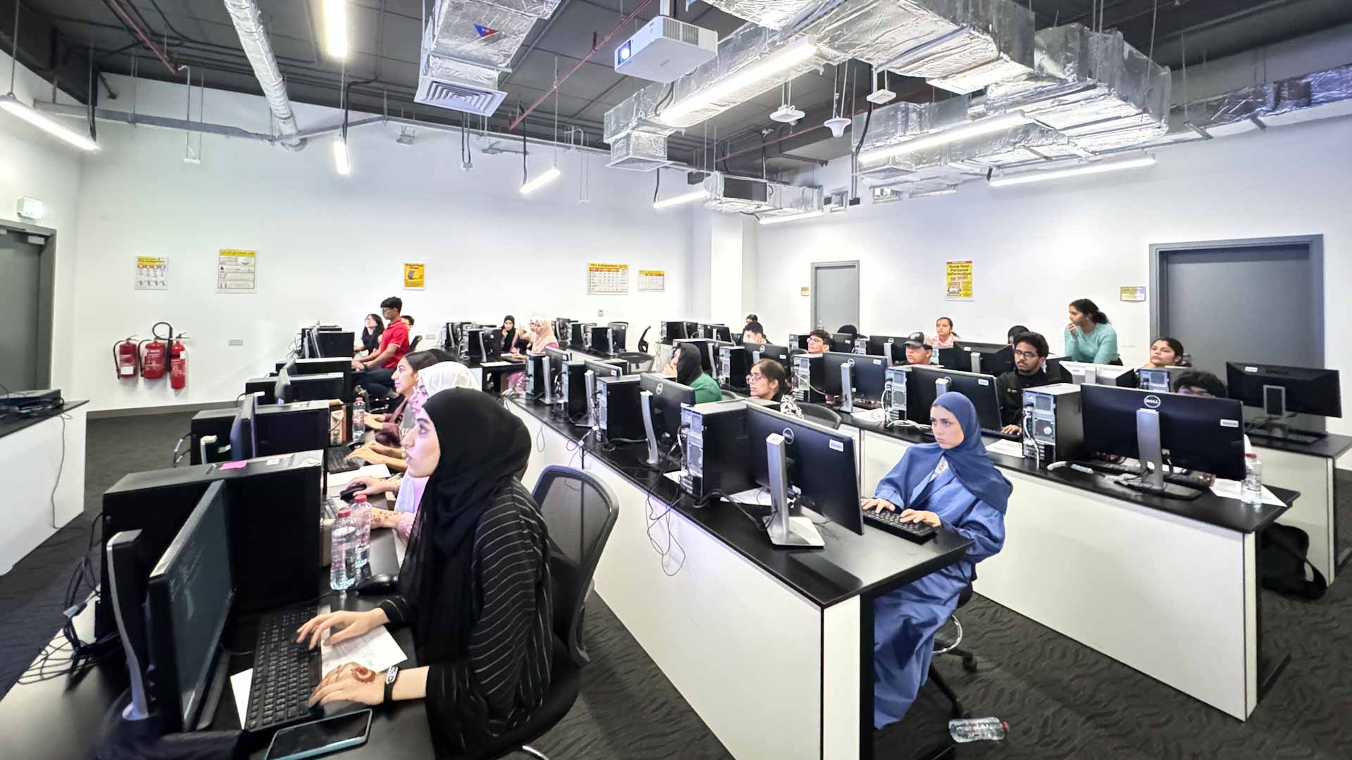 Image for the title: Students dive into innovation at AUS Summer Computing Boot Camp 