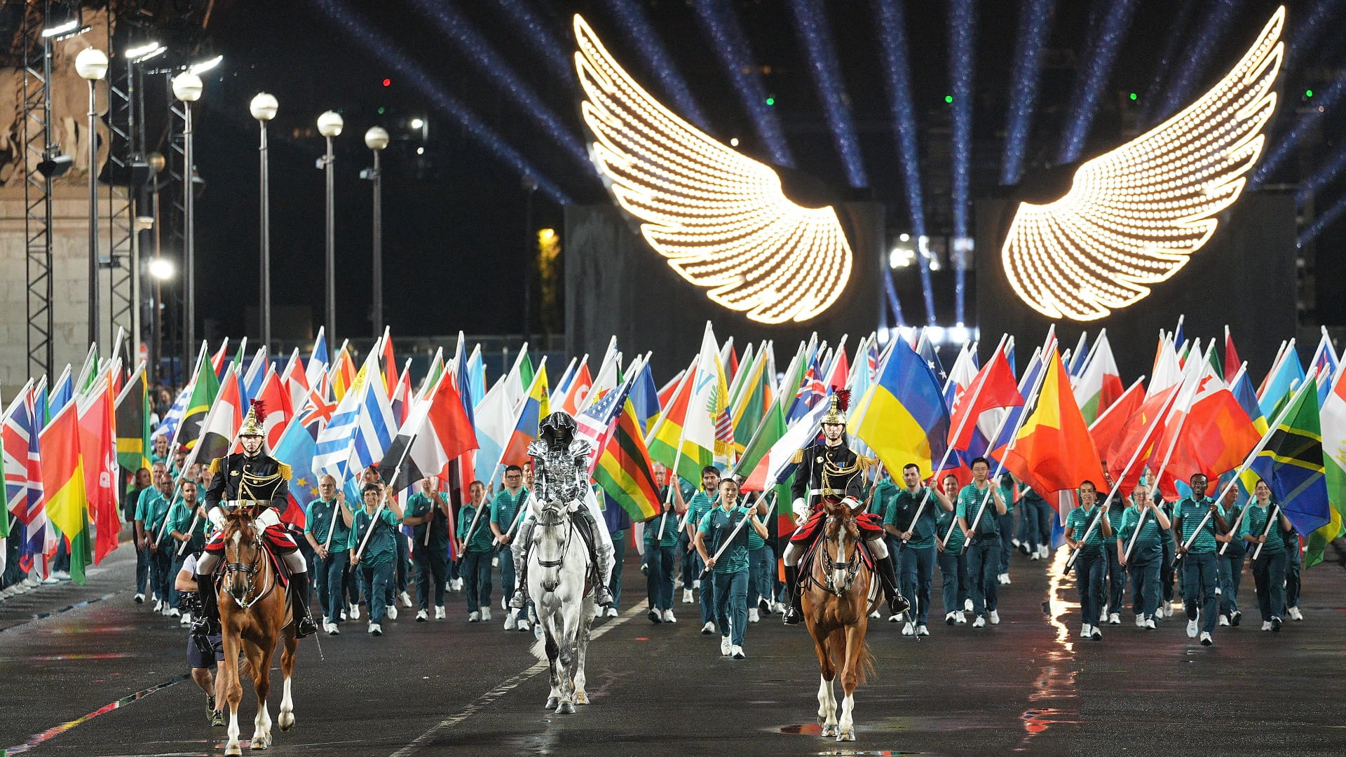 Image for the title: Historic river parade, Dion show-stopper ignite Paris Olympics 