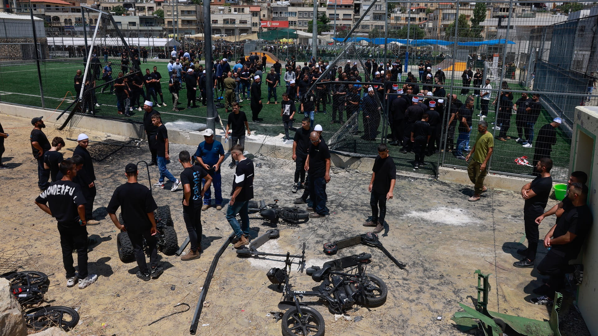 Image for the title: Israel vows retaliation after rocket kills 12 youths in Golan 