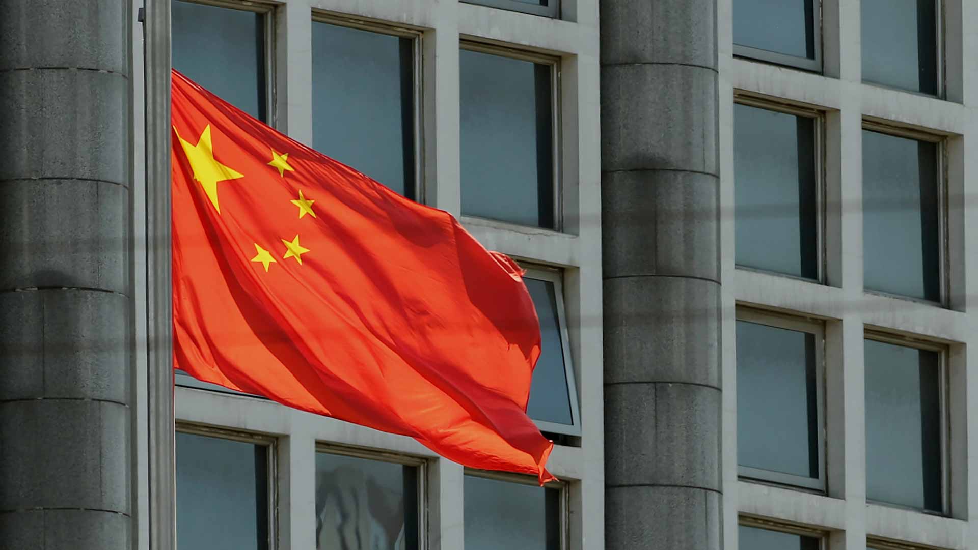 Image for the title: China factory activity shrinks for third straight month 