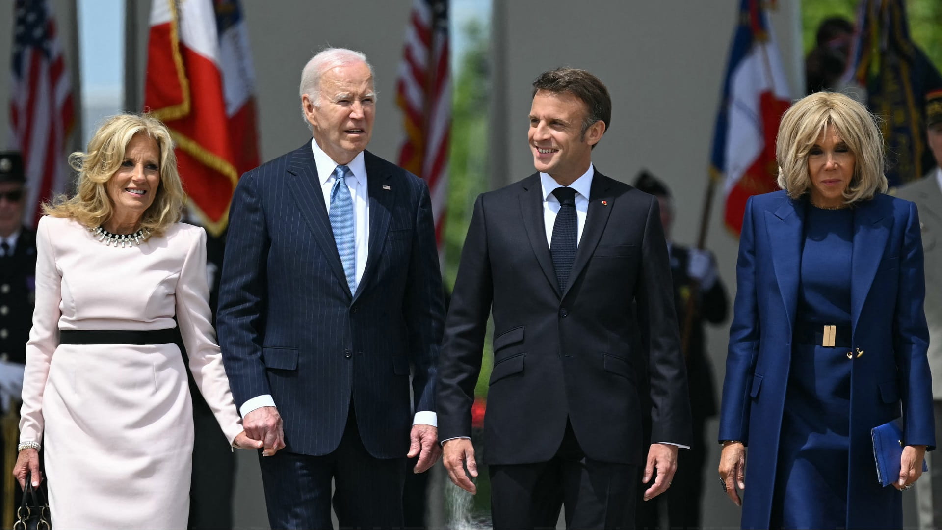 Image for the title: Macron welcomes Biden at Arc de Triomphe at start of state visit 