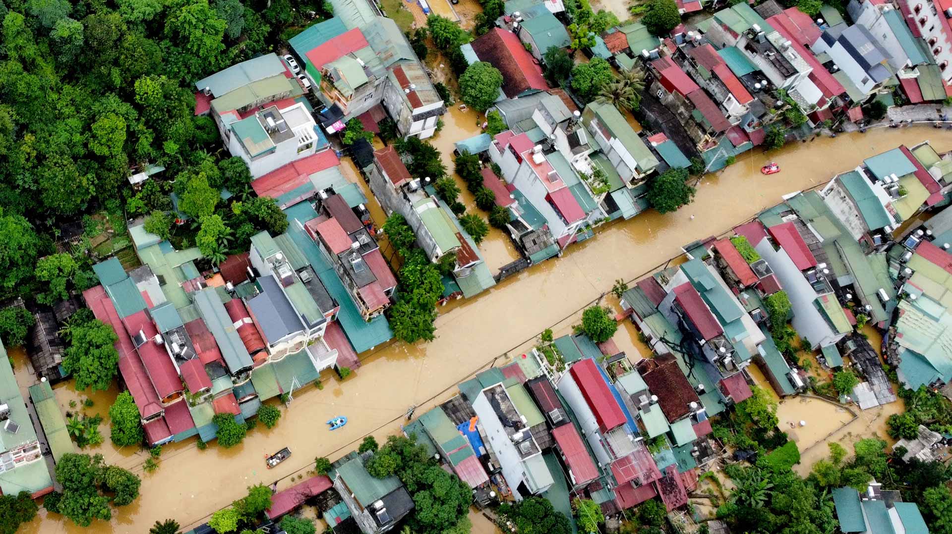 Image for the title: Flooding and landslides kill three in Vietnam's north 