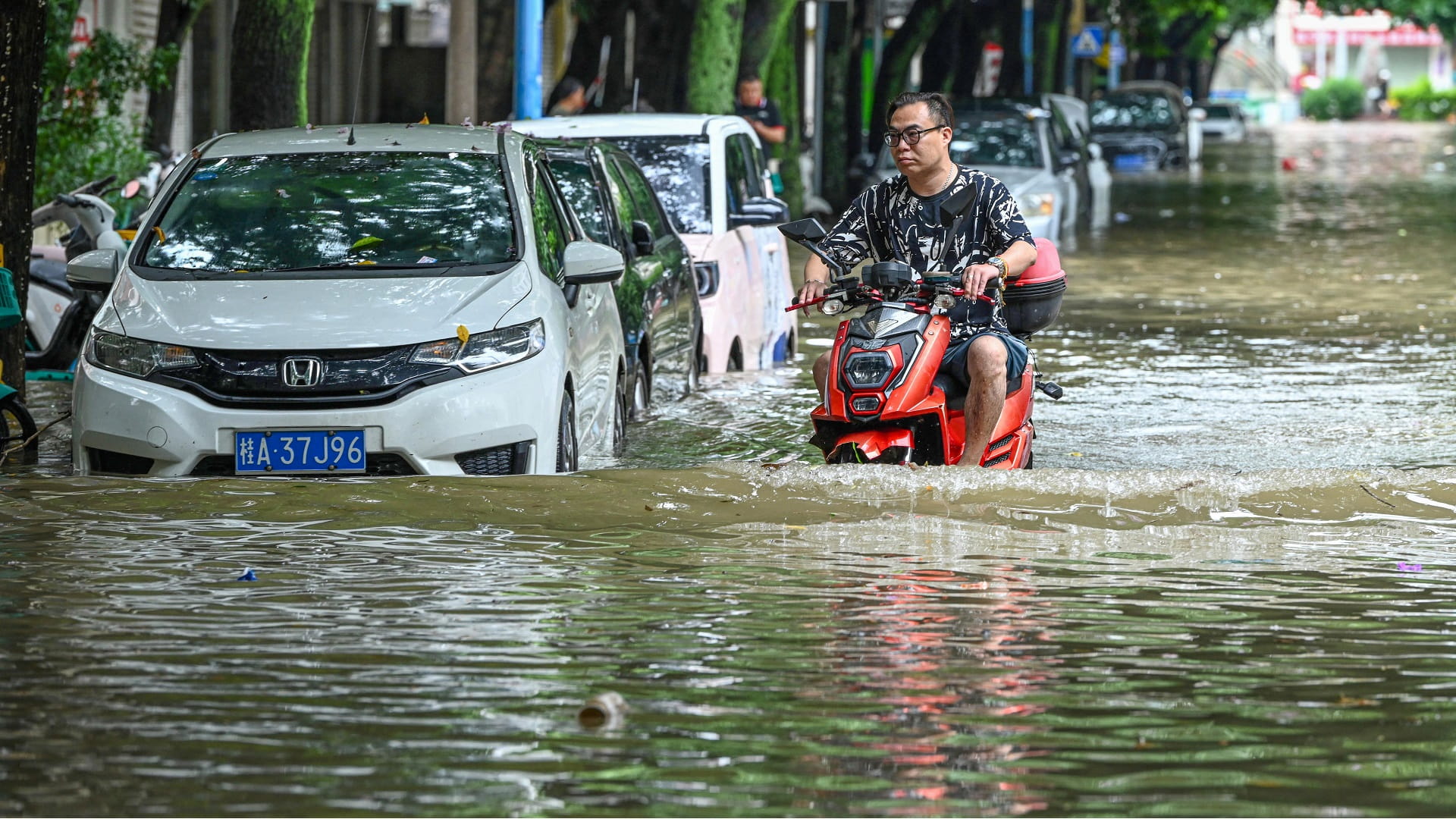 Image for the title: Five dead, 15 missing in south China's Guangdong floods 