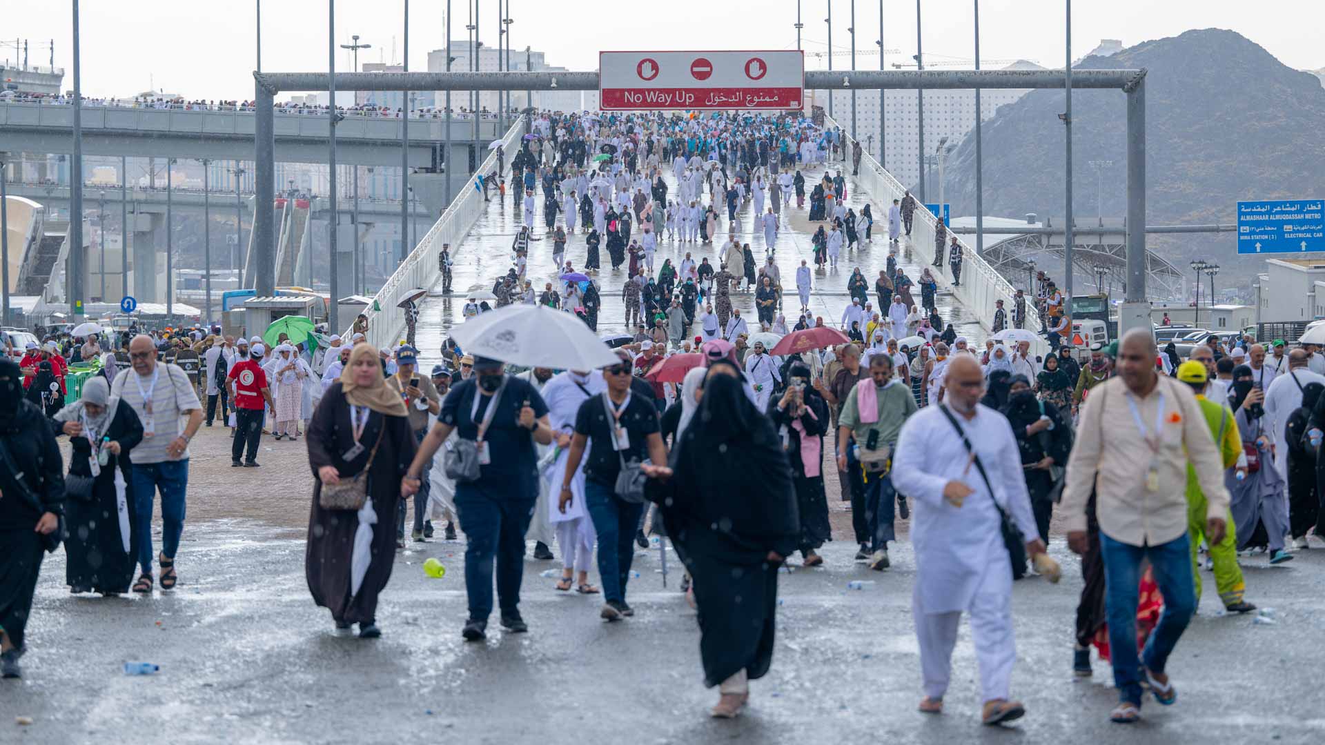 Image for the title: Pilgrims cast stones at Jamarat on second day of Tashreeq 