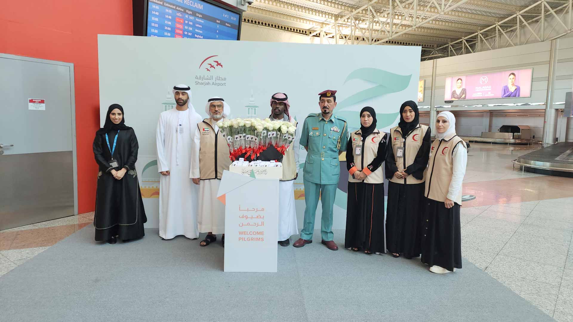 Image for the title: Al-Muhairi welcomes returning pilgrims to Sharjah Airport 