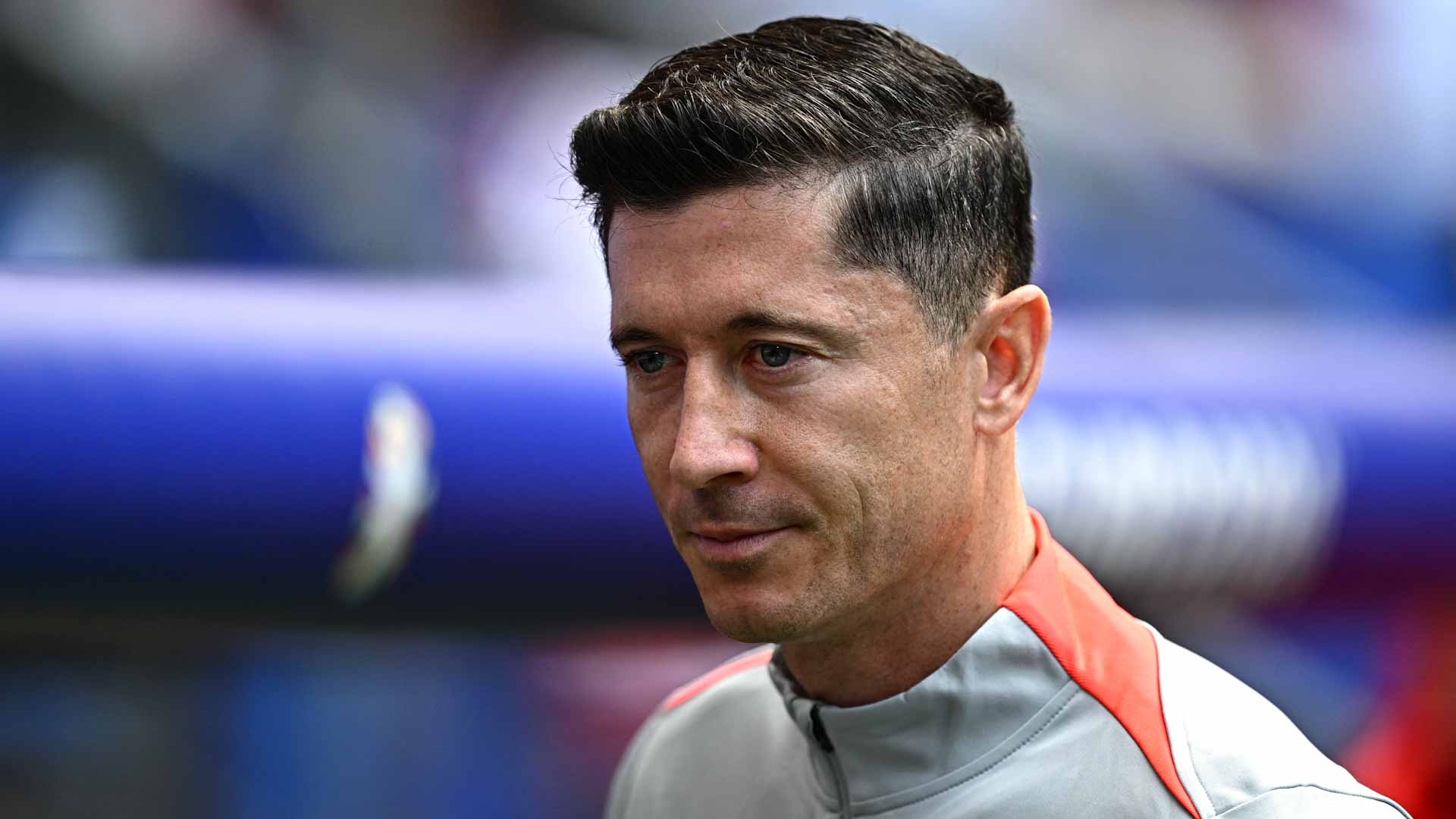 Image for the title: Lewandowski on bench for Poland against Austria 