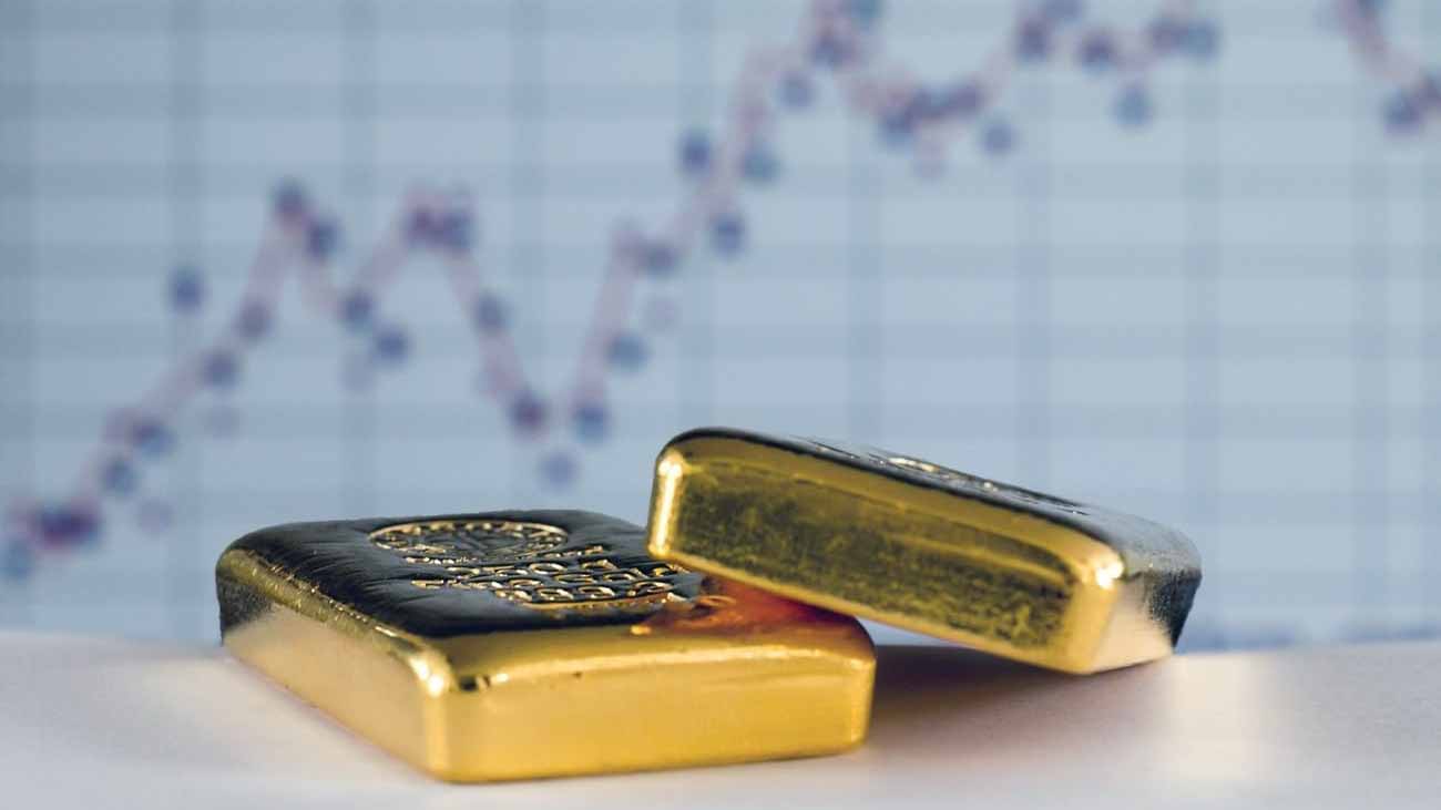 Image for the title: Gold retreats from near record-high levels 