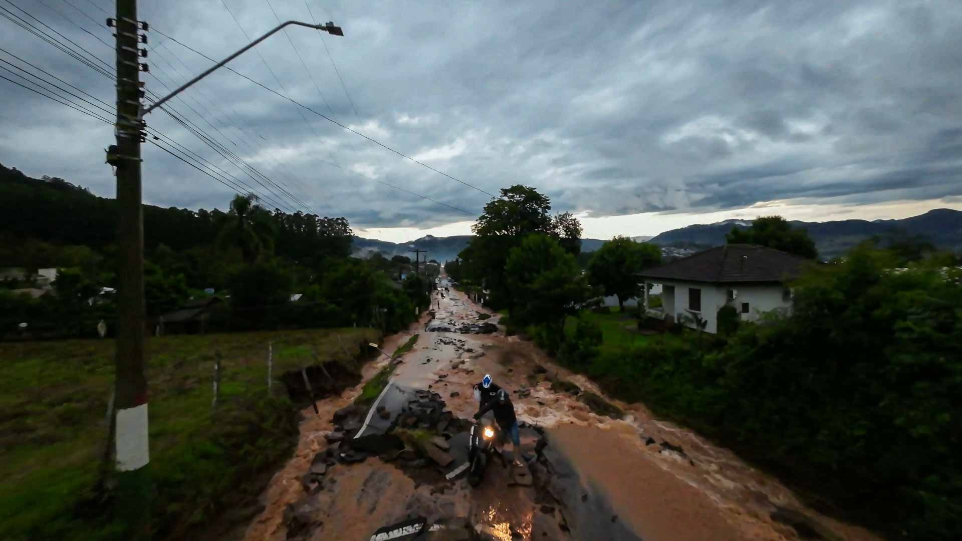 Image for the title: Heavy rains leave 5 dead, 18 missing in southern Brazil 