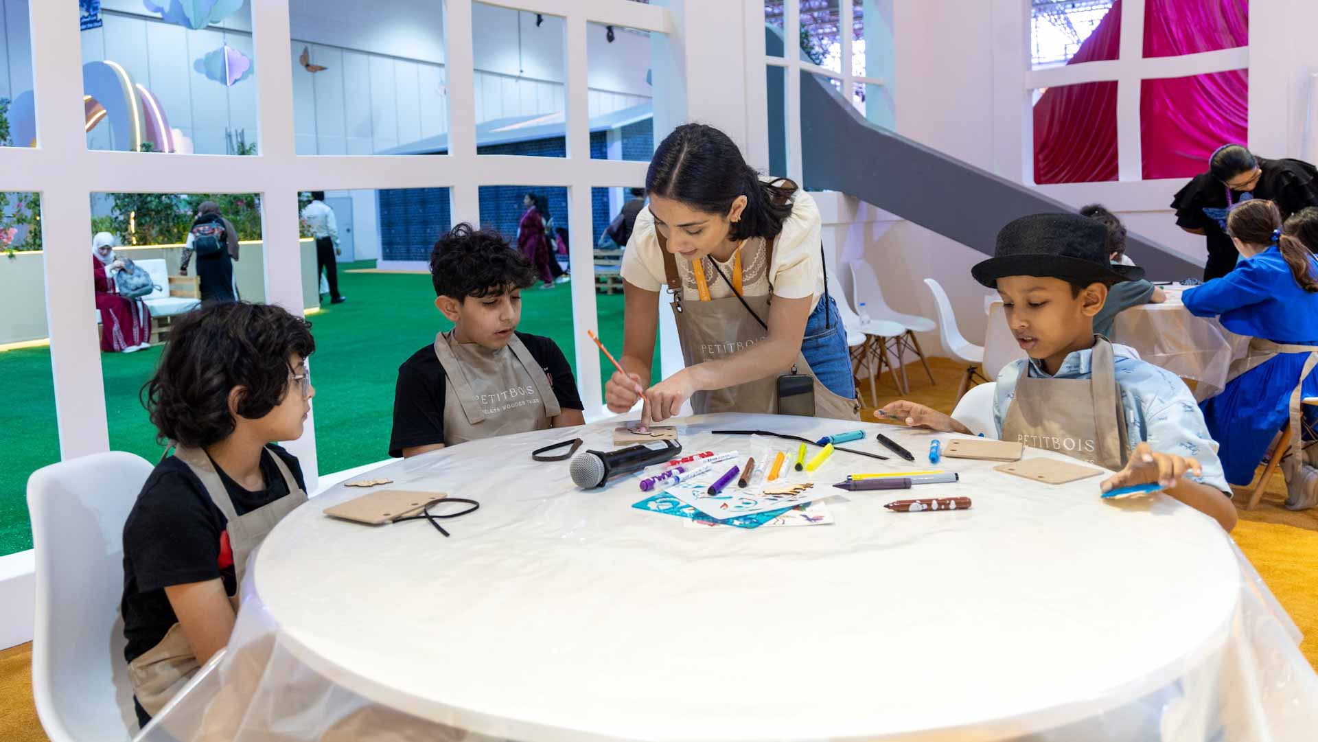 Image for the title: Artists as young as eight craft their story books at SCRF 2024 