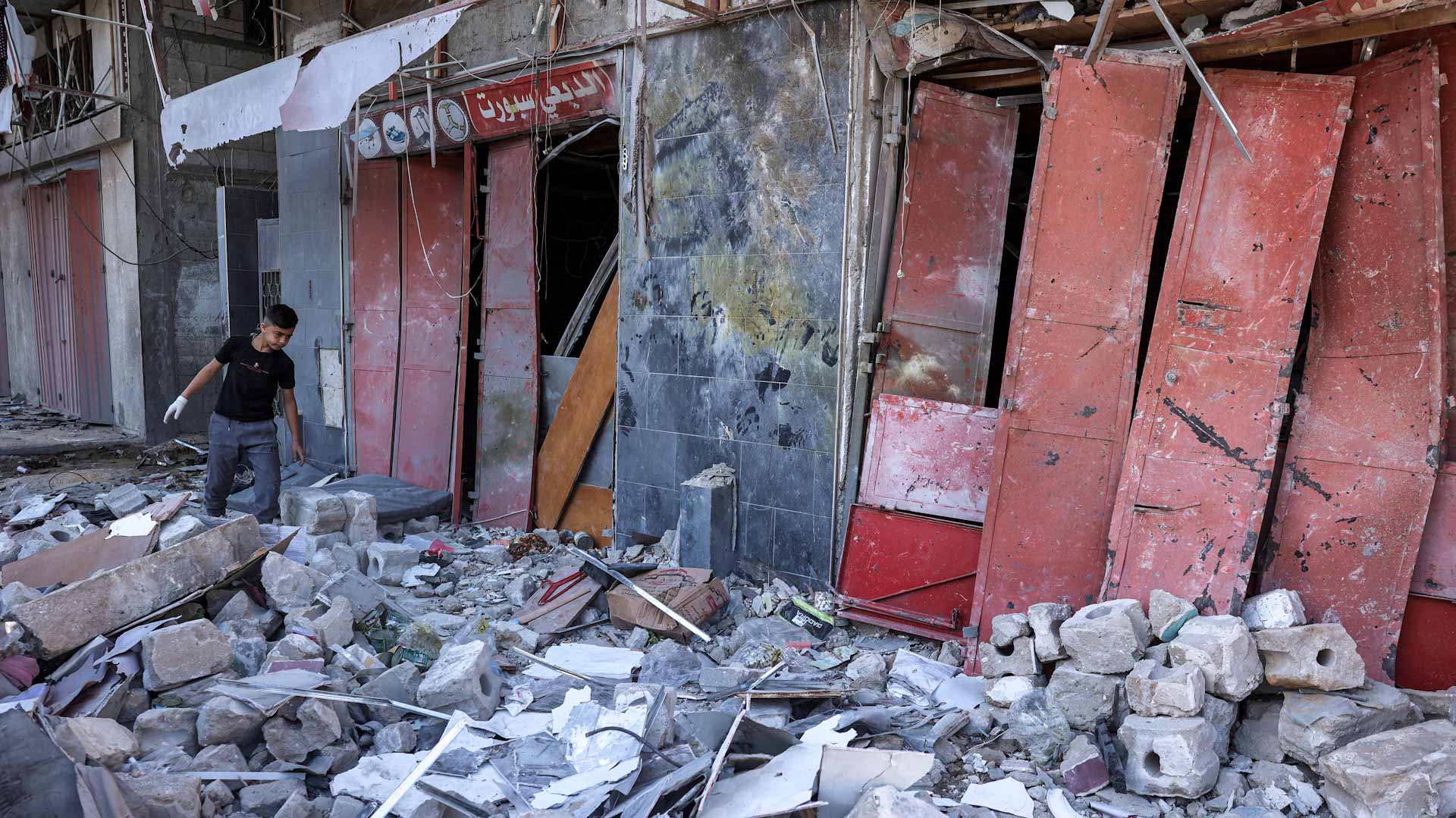 Image for the title: Israel launches new Gaza strikes as negotiators work towards truce 