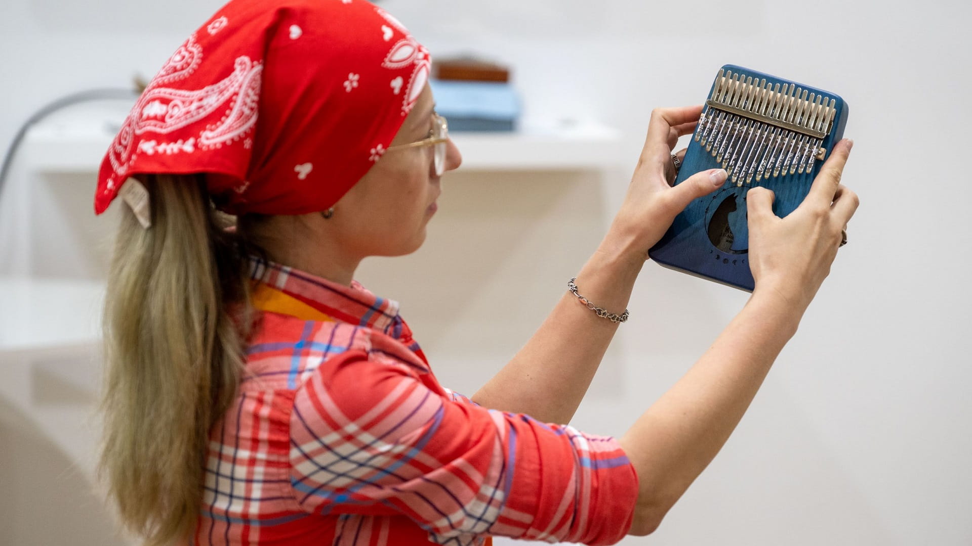 Image for the title: Delightful melodies of African Kalimba entertain children at SCRF 
