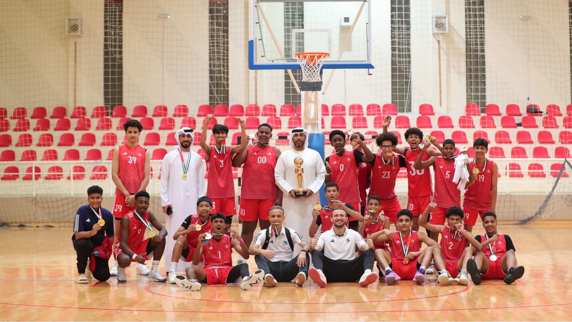 Image for the title: Sharjah juniors win 7th basketball league title, beating Al Nasr 